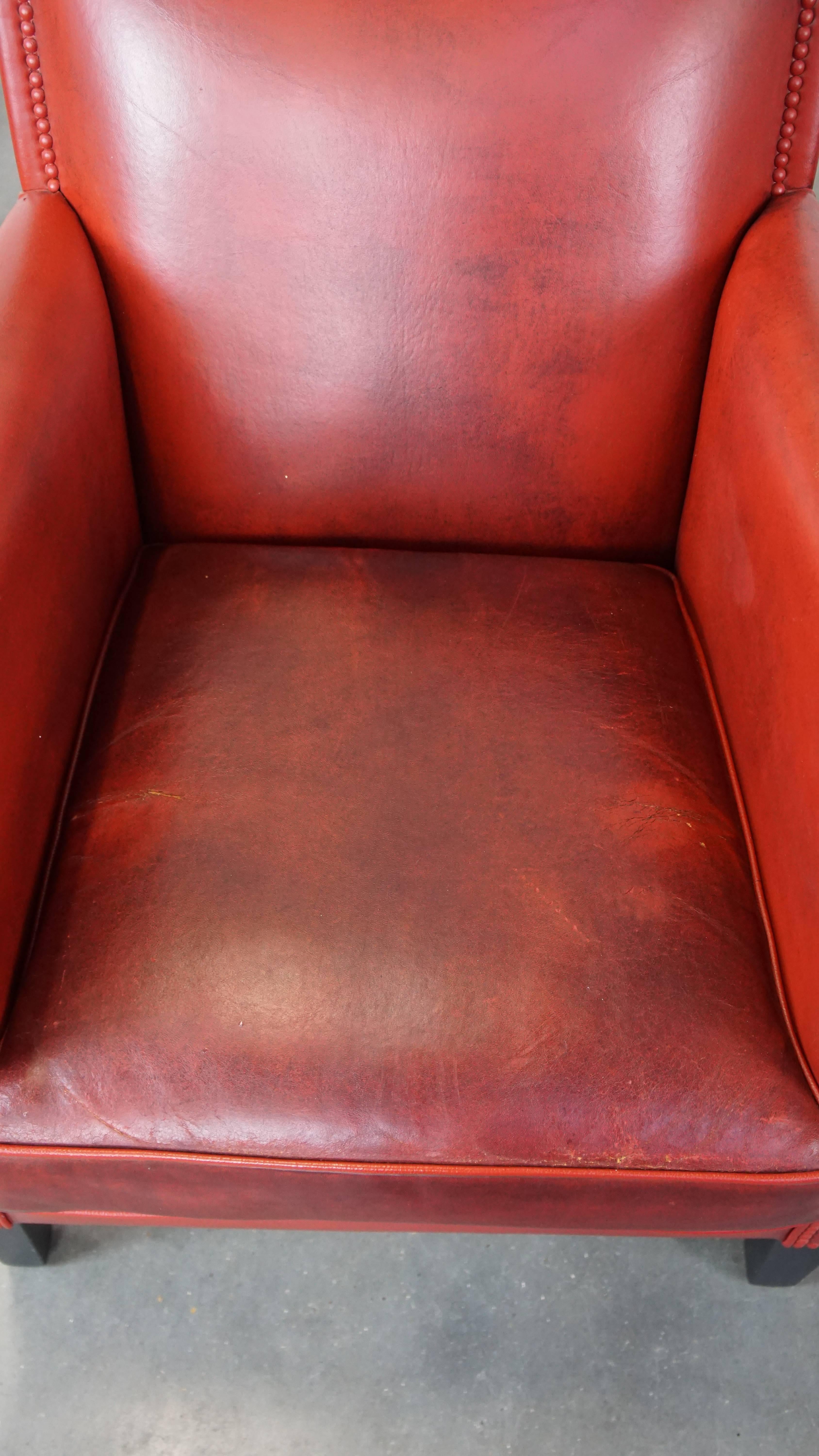 20th Century Set of 2 comfortable, unique, stylish, red-colored sheepskin design armchairs For Sale