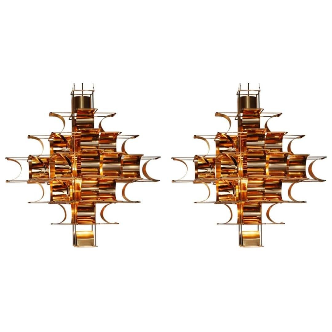 Set of 2 copper Cassiope 9 level suspension lamps by Sebastien Sauze
Dimensions: Ø 100 x H 100 cm.
Weight: 12 kg.
Light source: x2 E27-LED

This beautiful lighting creation of Sauze exist also in 75 cm, it is also available.
It exists in