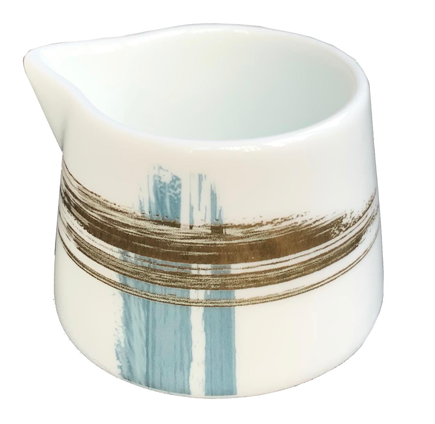 Larger quantities available upon request, with 8 weeks production time.

Description: Creamer (2 pieces)
Color: Blue and gold
Size: 6.5 x 6 x 4.5H cm, 50 ml
Material: Porcelain and gold
Collection: Artisan Brush