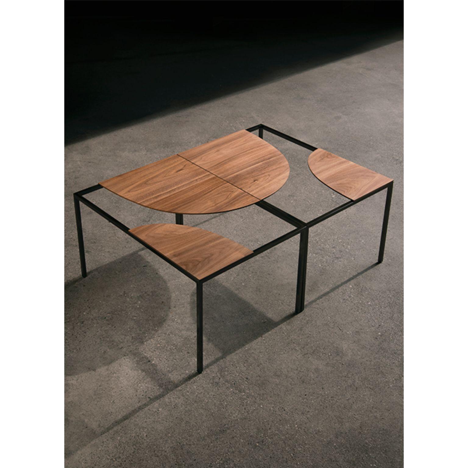 Set of 2 creek coffee table by Nendo
Materials: Top: solid wood (Also available in Powder coated metal)
 Structure: black chrome metal
Dimensions: W 90 x D 60 x H 31.7 cm

Creek is a table that suggests a stream of water flowing freely across