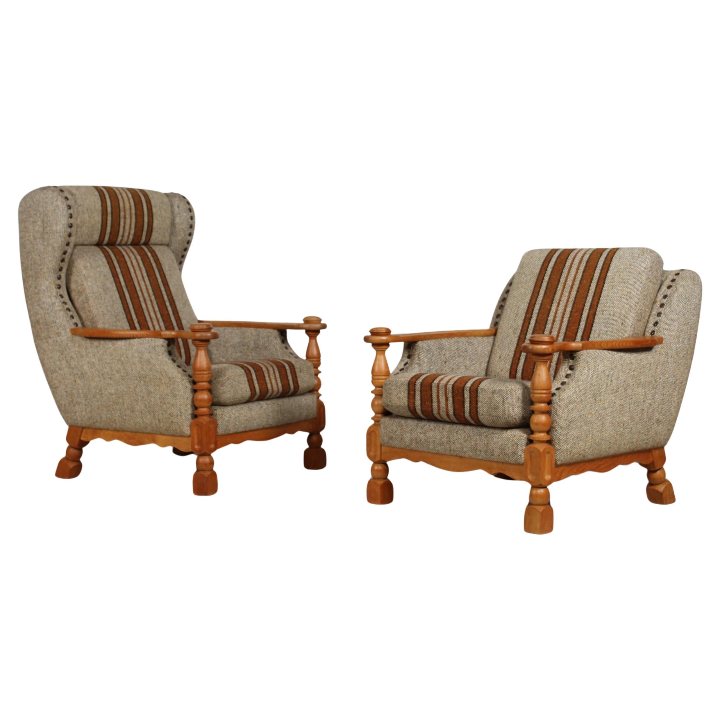 Set of 2 Danish Henning Kjærnulf style Lounge Chairs of Solid Oak  1970s For Sale