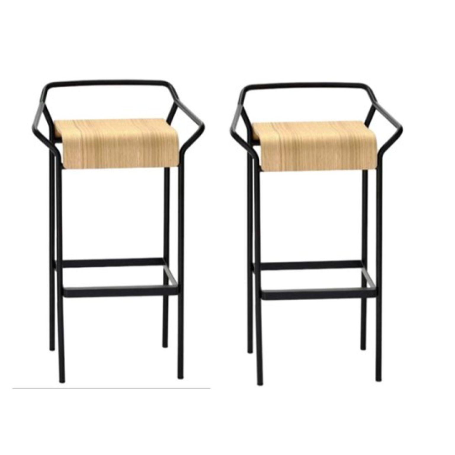 Set of 2 DAO High Stools by Shin Azumi
Materials: Barstool, structure in black or white lacquered metal. Seat in oak veneer or black lacquer on plywood.
Technique: Lacquered metal, natural and stained wood. 
Dimensions: W 49 x D 40 x H 86