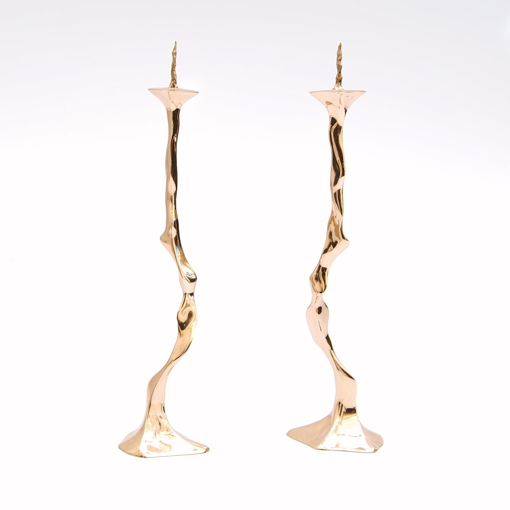 Set of 2 Debbie candlesticks by Fakasaka Design
Dimensions: W 6 cm D 5 cm H 24 cm each.
Materials: polished bronze.

 FAKASAKA is a design company focused on production of high-end furniture, lighting, decorative objects, jewels, and