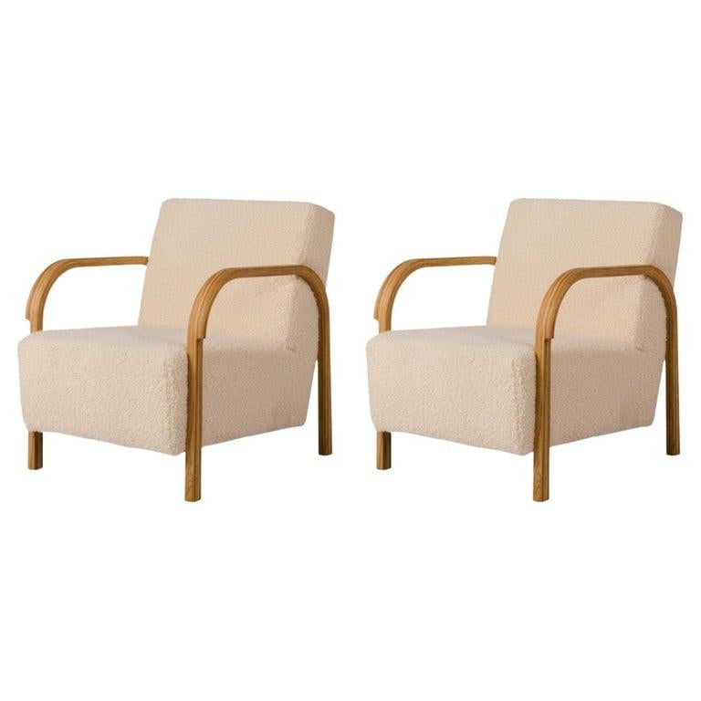 Set of 2 DEDAR/Artemidor ARCH lounge chairs by Mazo Design
Dimensions: W 69 x D 79 x H 76 cm
Materials: Oak, Sheepskin

With the new ARCH collection, mazo forges new paths with their forward-looking modernism. The series is a tribute to the