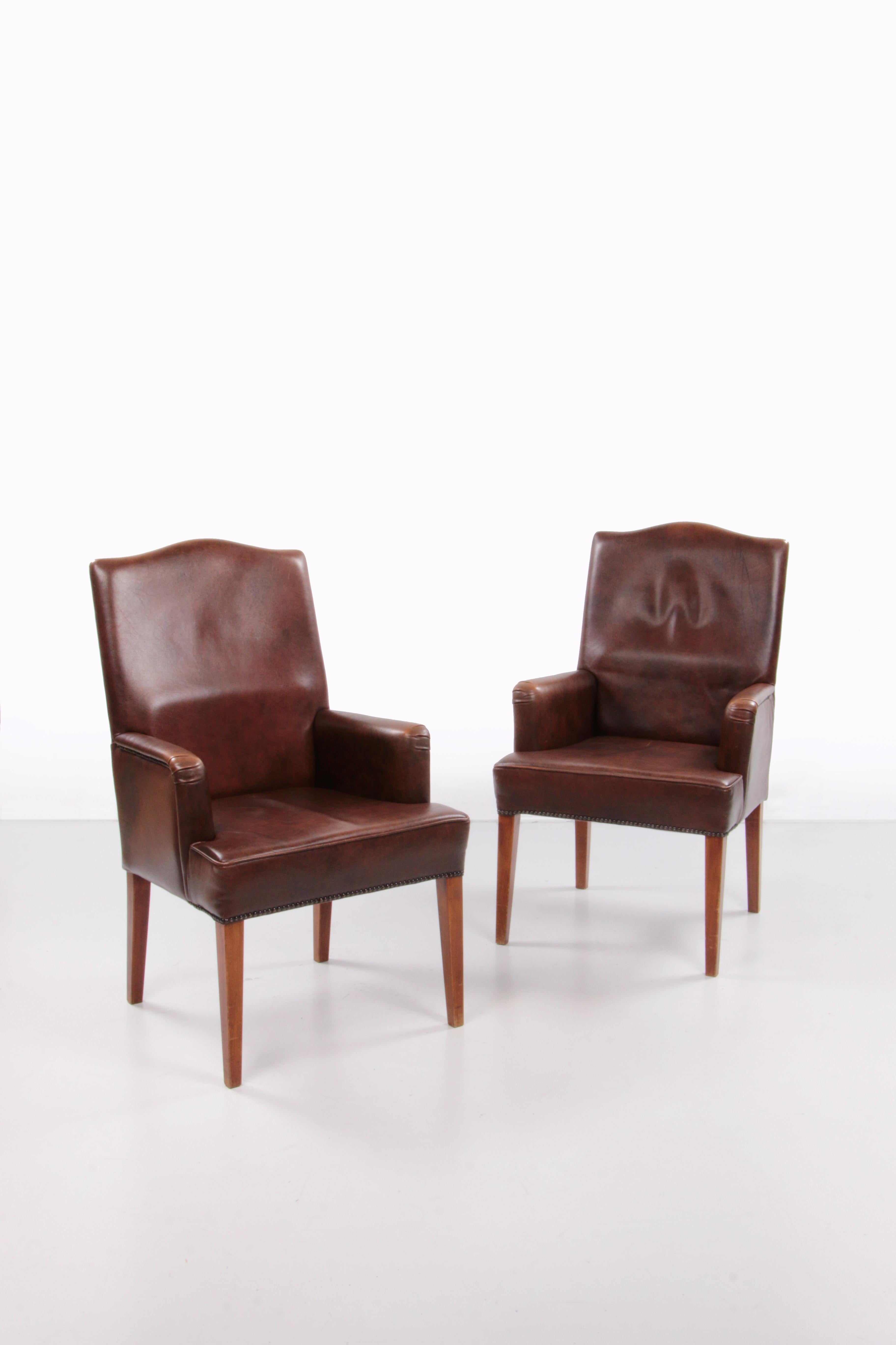 Set of 2 dining room chairs in sheep leather, 1970 Netherlands.


This is a set of leather chairs made of sheep leather.

Made in the Netherlands somewhere in the 1970s. These chairs are in perfect condition. The seat height is 46 cm.

Beautiful set