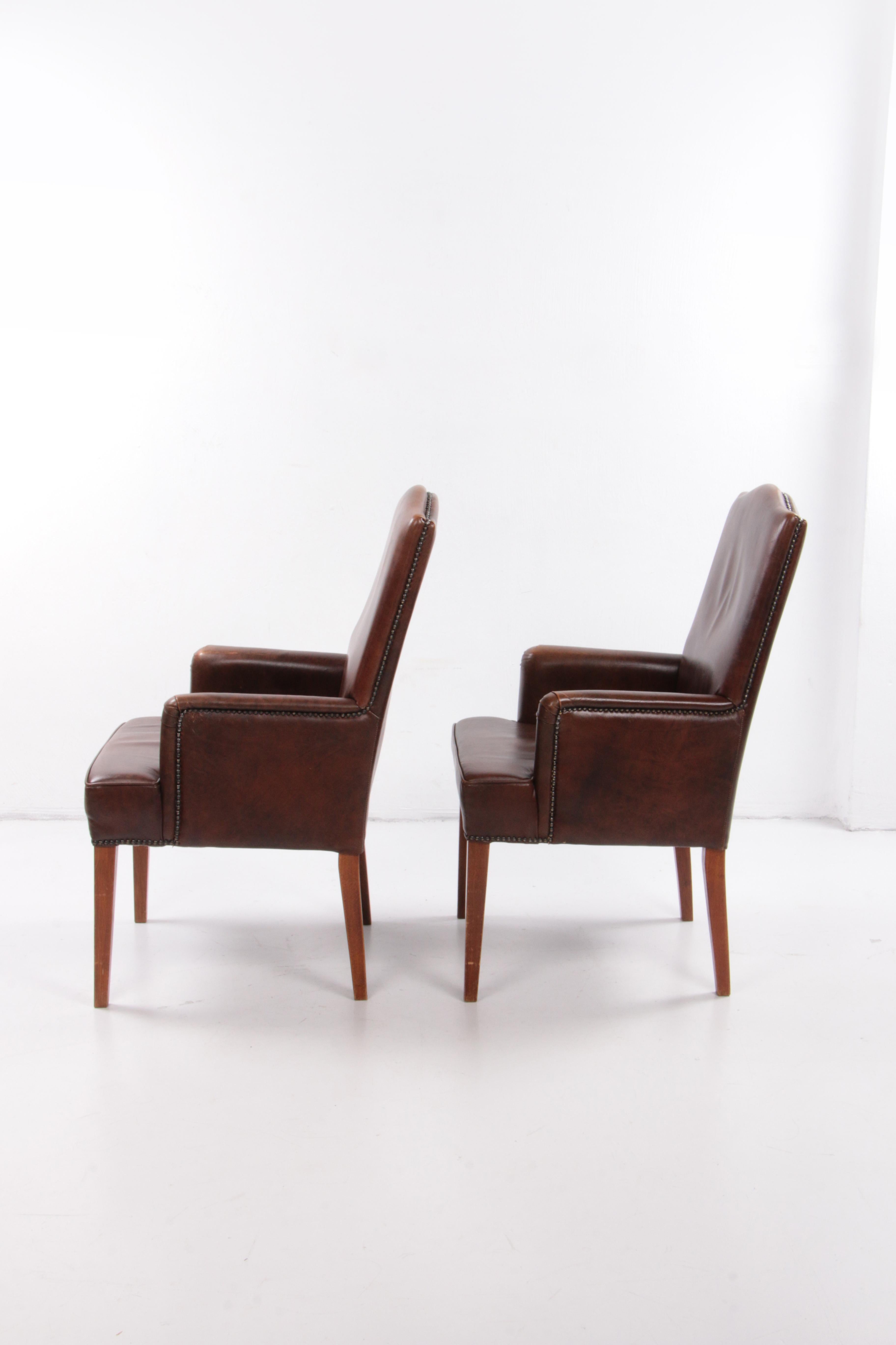 Dutch Set of 2 dining room chairs in sheep leather, 1970 Netherlands. For Sale