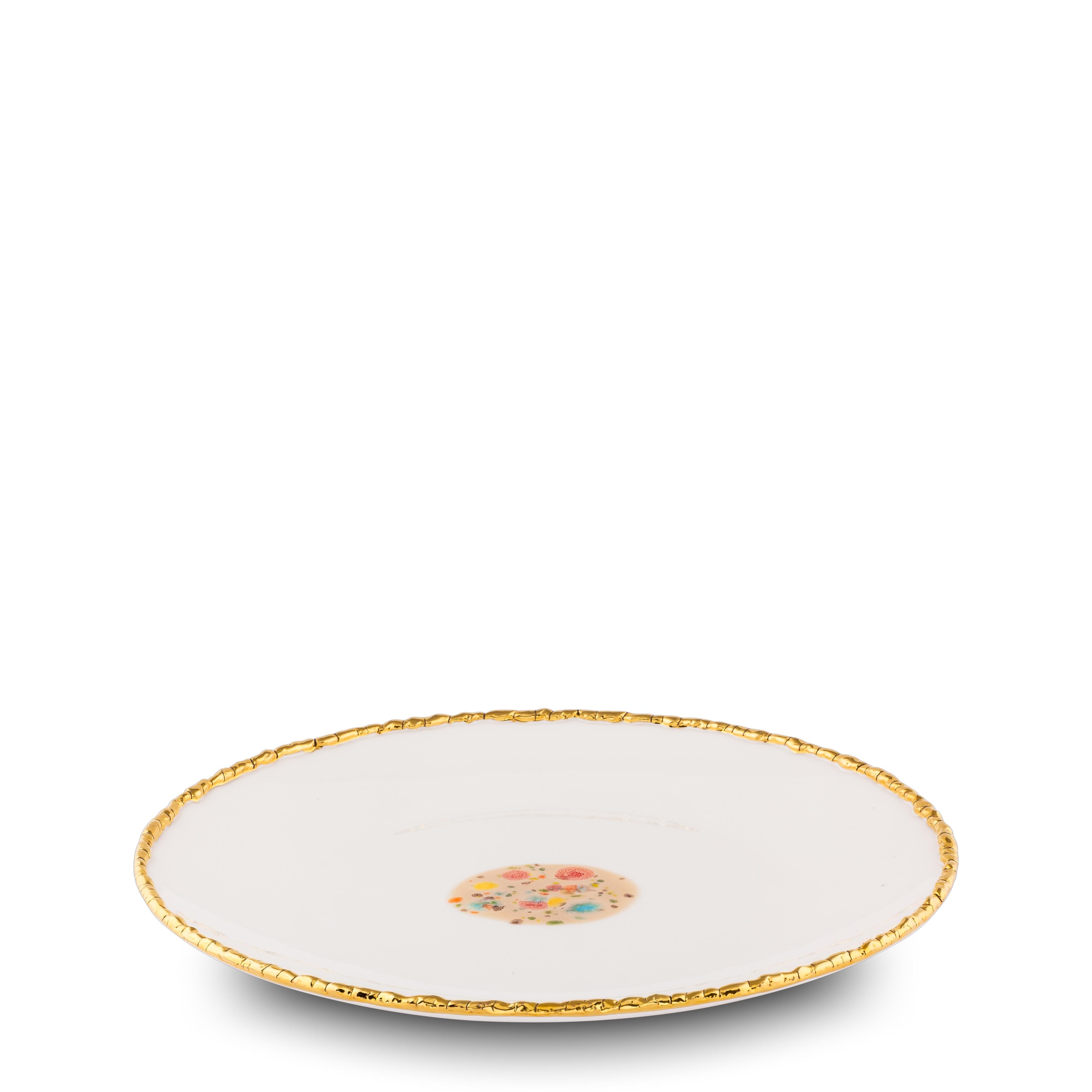 Handcrafted in Italy from the finest porcelain, this white craquelé edge dinner coupe plate from the Chestnut collection has an original golden craquelé rim emphasizing the brilliant white glaze and the Classic, dotted decoration at the