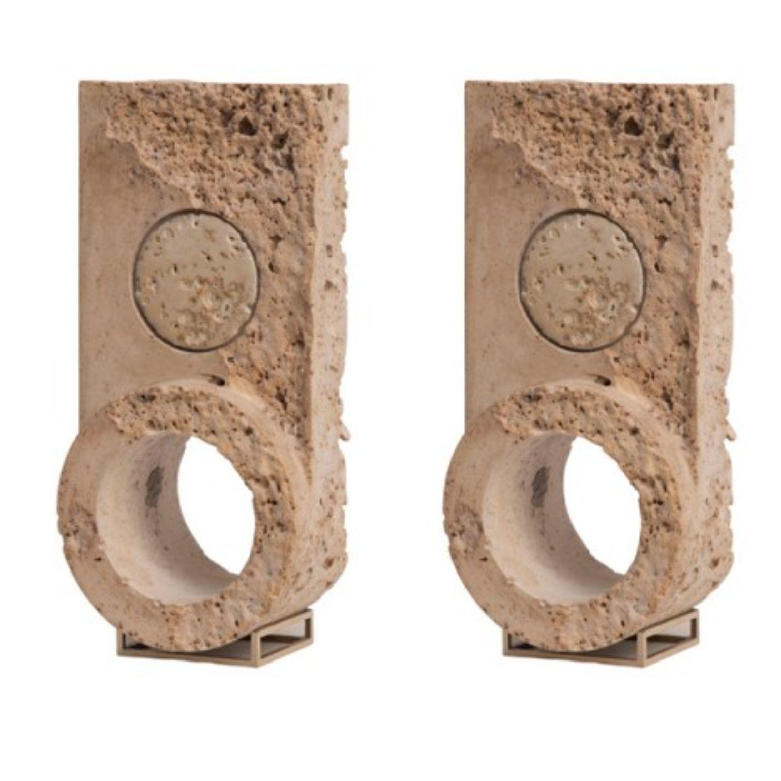 Set of 2 disc clocks by Turbina
Dimensions: D24 x W11 x H7.5 cm each
Materials: Cast Stone, Nickel, Plated Brass

No hours, no minutes, no seconds. 
The Clock series inform us on the trace of time. Through a slow rotation, Disc Clock place us in an