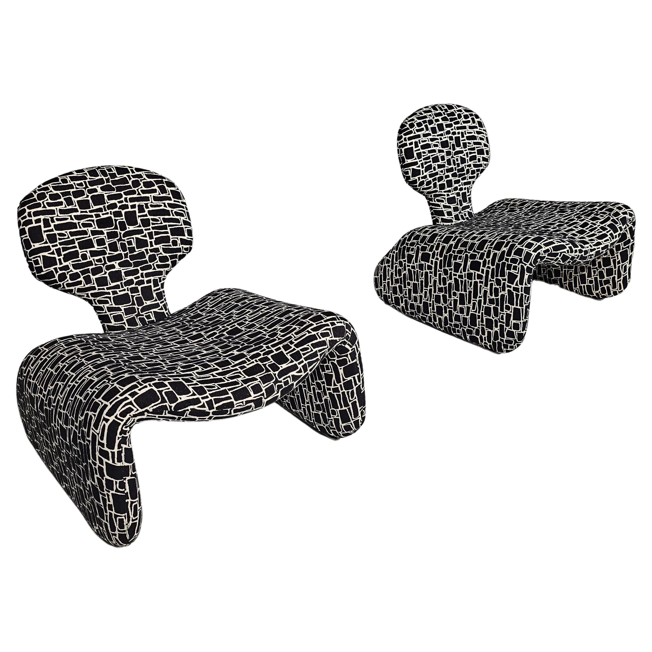 Pair of 1970s Djinn lounge chairs by Olivier Mourque. Reupholstered in a stunning black and cream Geomatrical Toile de Tours bouclette by La Maison Pierre Frey. The color on the video is the most accurate.

The Djinn chair is one element of a series
