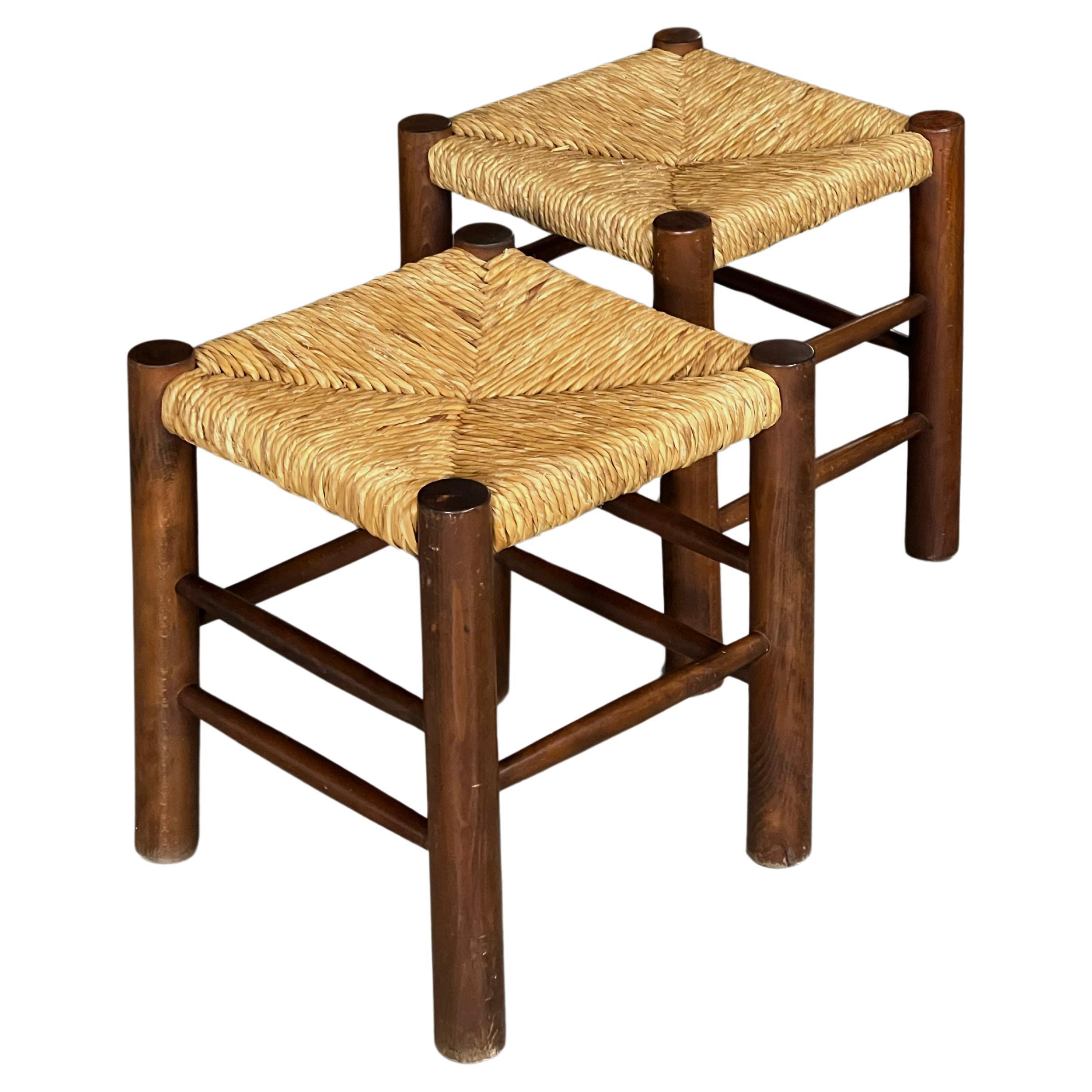 Set of 2 Dordogne stools in the style of Charlotte Perriand for Robert Sentou For Sale