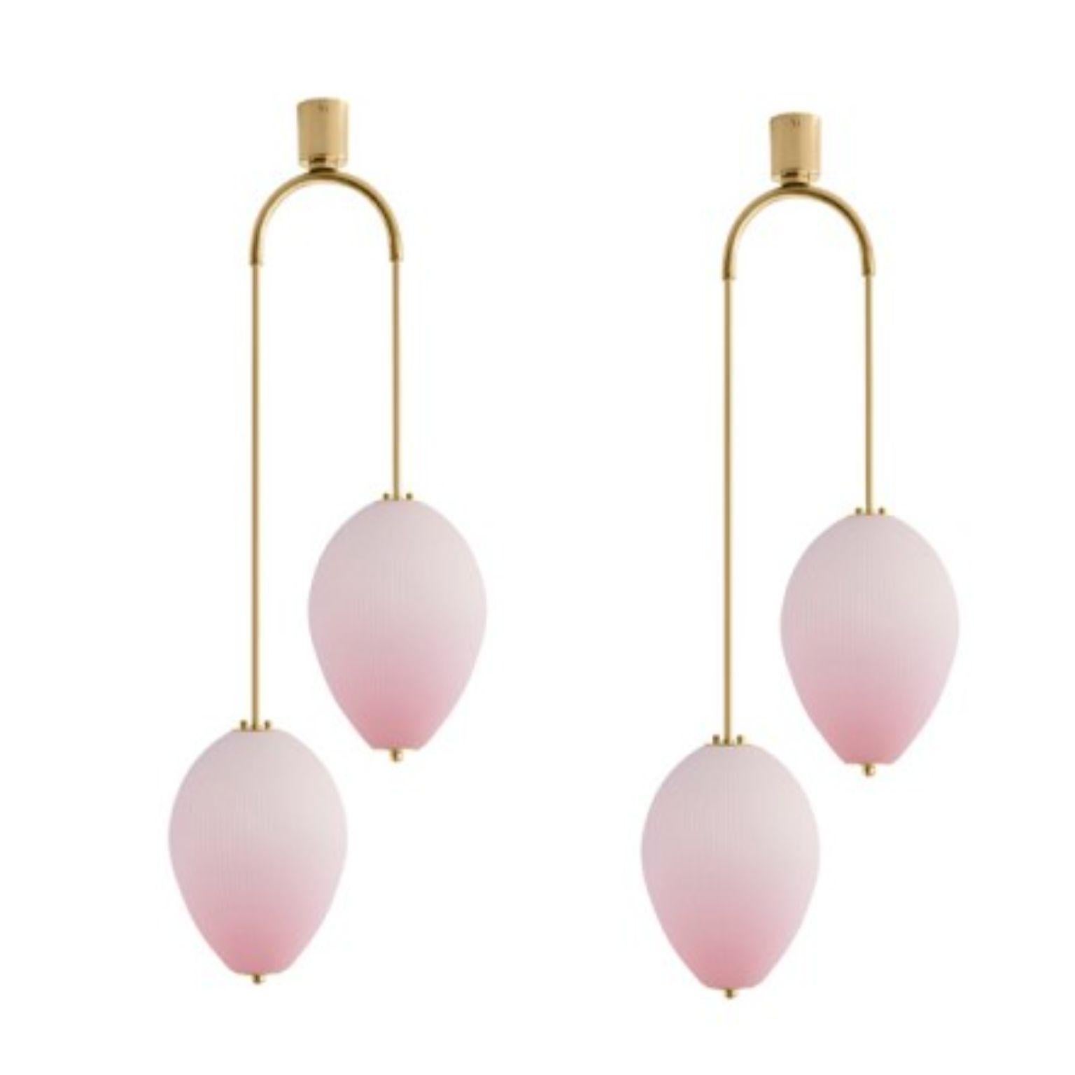 Double chandelier China 10 by Magic Circus Editions
Dimensions: H 121.5 x W 44.3 x D 25.2 cm
Materials: Brass, mouth blown glass sculpted with a diamond saw
Colour: soft rose

Available finishes: Brass, nickel
Available colours: enamel soft white,