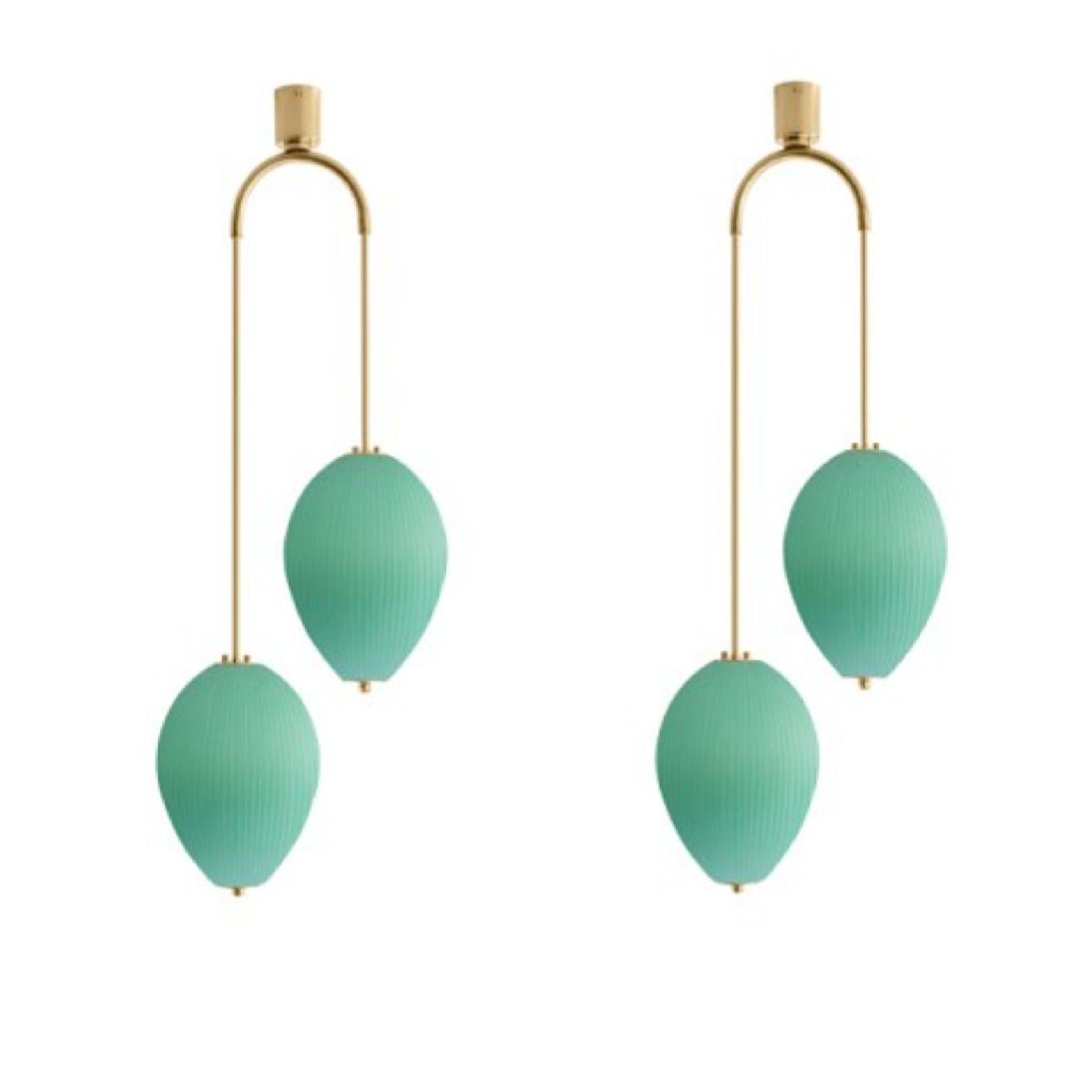 Double chandelier China 10 by Magic Circus Editions
Dimensions: H 121.5 x W 44.3 x D 25.2 cm
Materials: Brass, mouth blown glass sculpted with a diamond saw
Colour: jade green

Available finishes: Brass, nickel
Available colours: enamel soft white,
