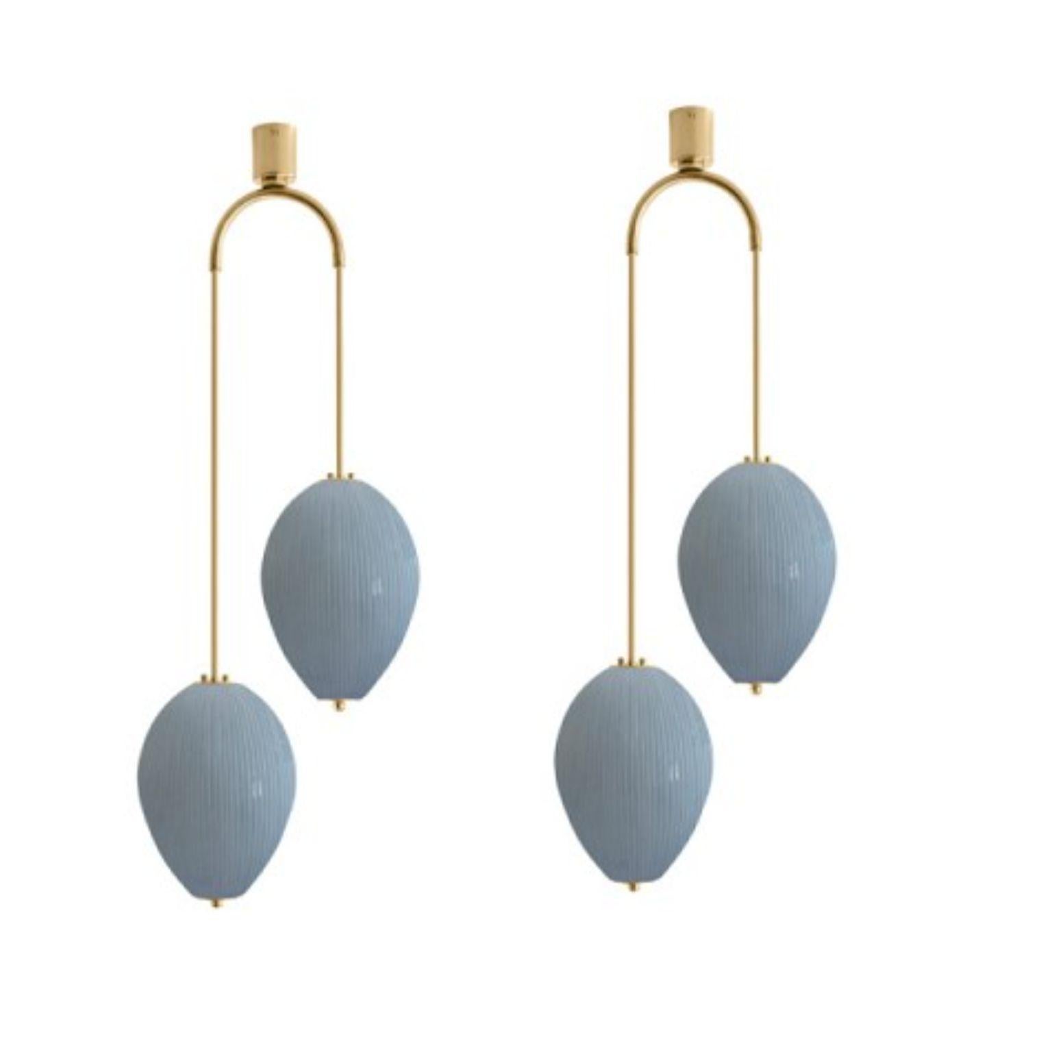Double chandelier China 10 by Magic Circus Editions.
Dimensions: H 121.5 x W 44.3 x D 25.2 cm.
Materials: brass, mouth blown glass sculpted with a diamond saw.
Colour: opal grey.

Available finishes: brass, nickel.
Available colours: enamel