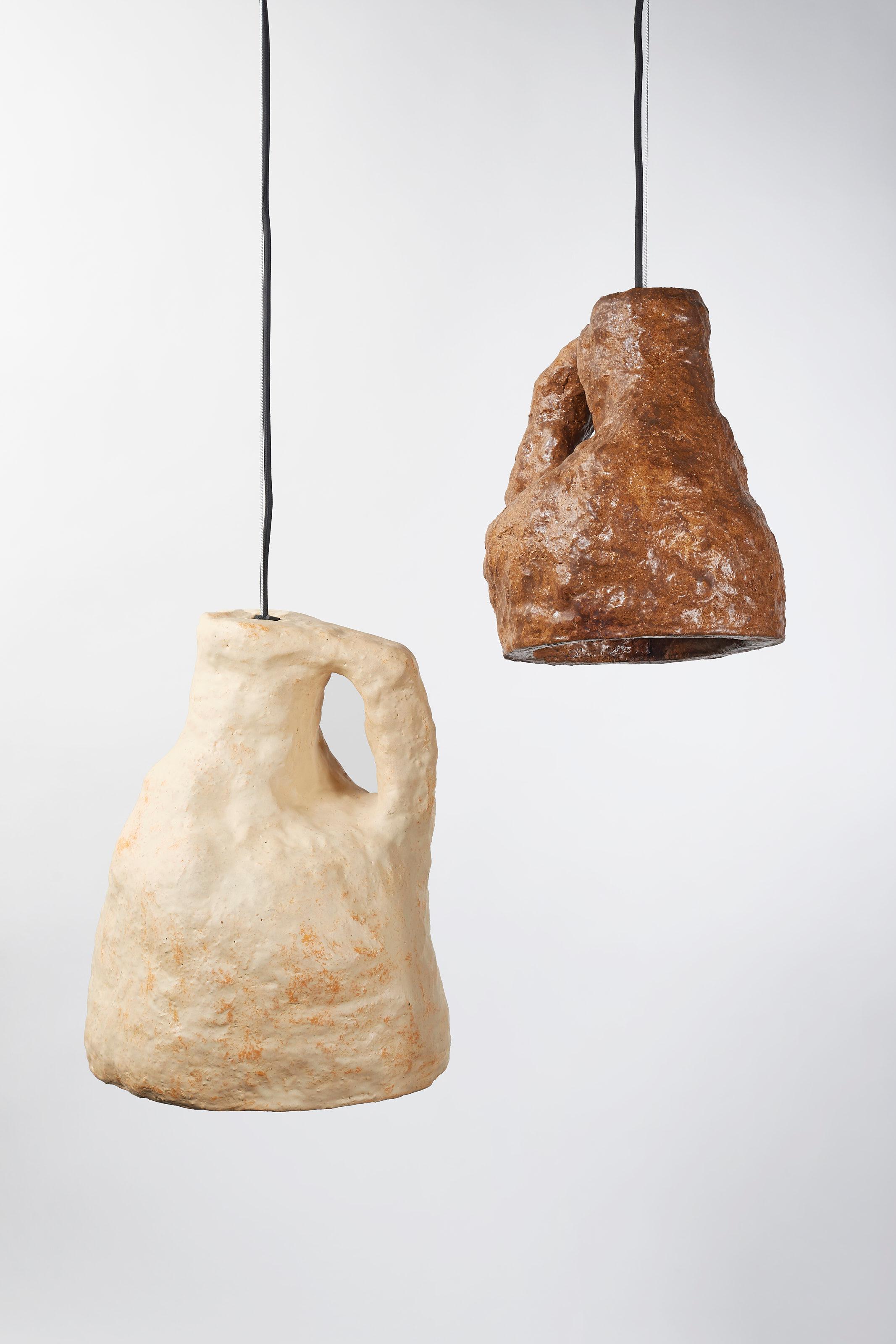 Set of 2 dual lamps by Willem Van Hooff
Dimensions: W 25 x H 30 cm // W35 x H50 cm
Materials: Earthenware, ceramic, pigments and glaze
Also available in different colours: oker, terra, ivory, brown. 

All our lamps can be wired according to