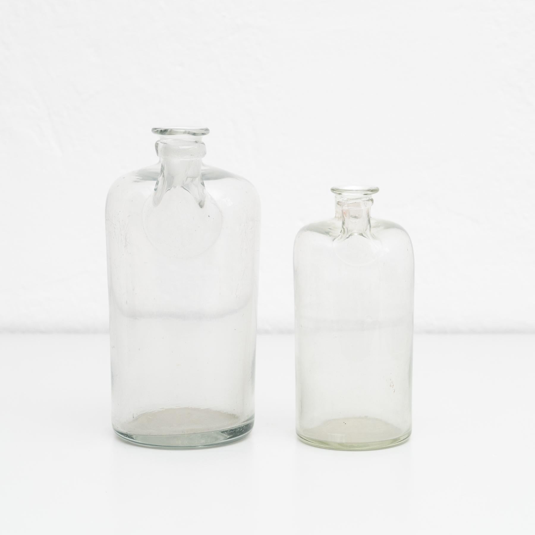 Spanish Set of 2 Early 20th Century Rustic Glass Bottles For Sale