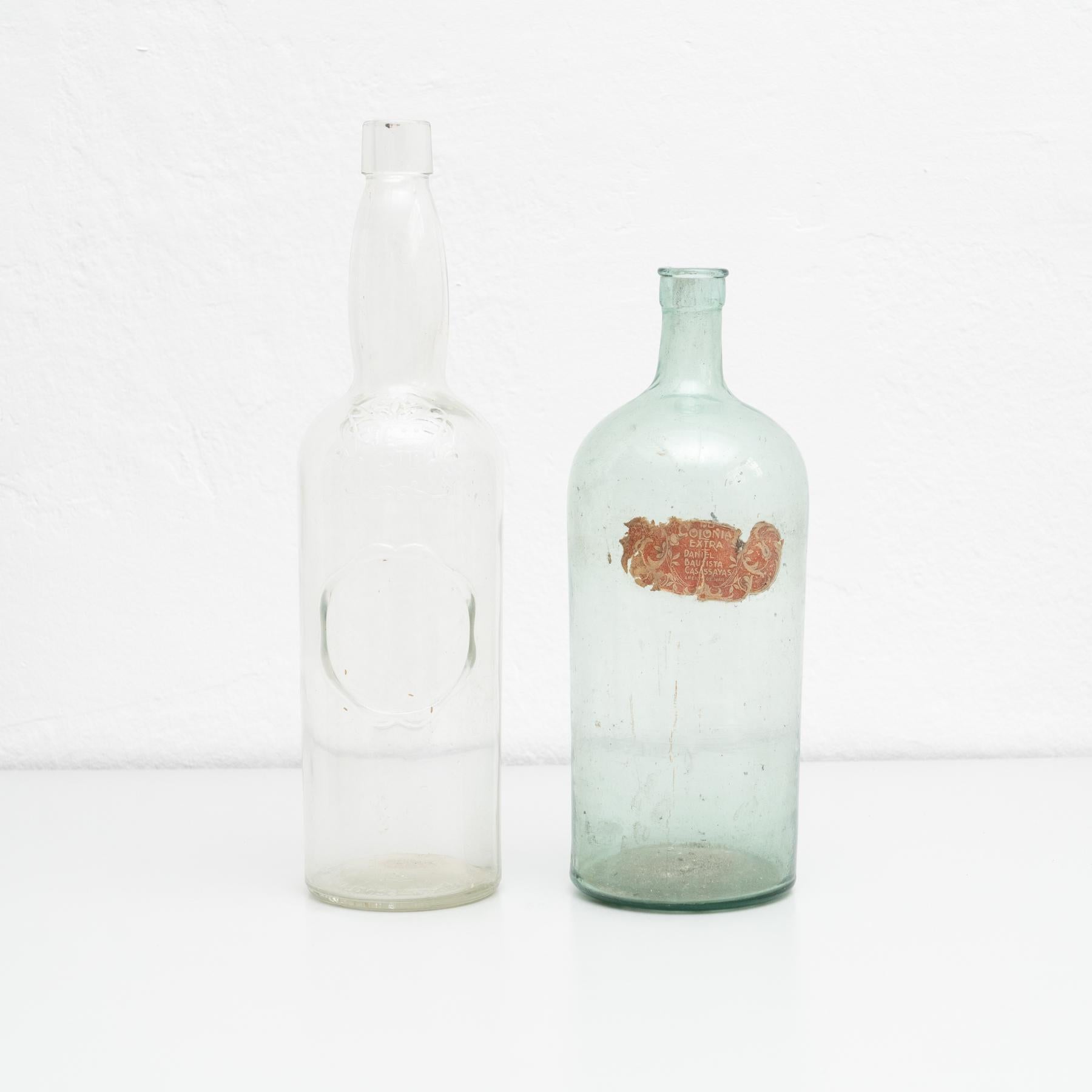 Spanish Set of 2 Early 20th Century Rustic Glass Bottles For Sale