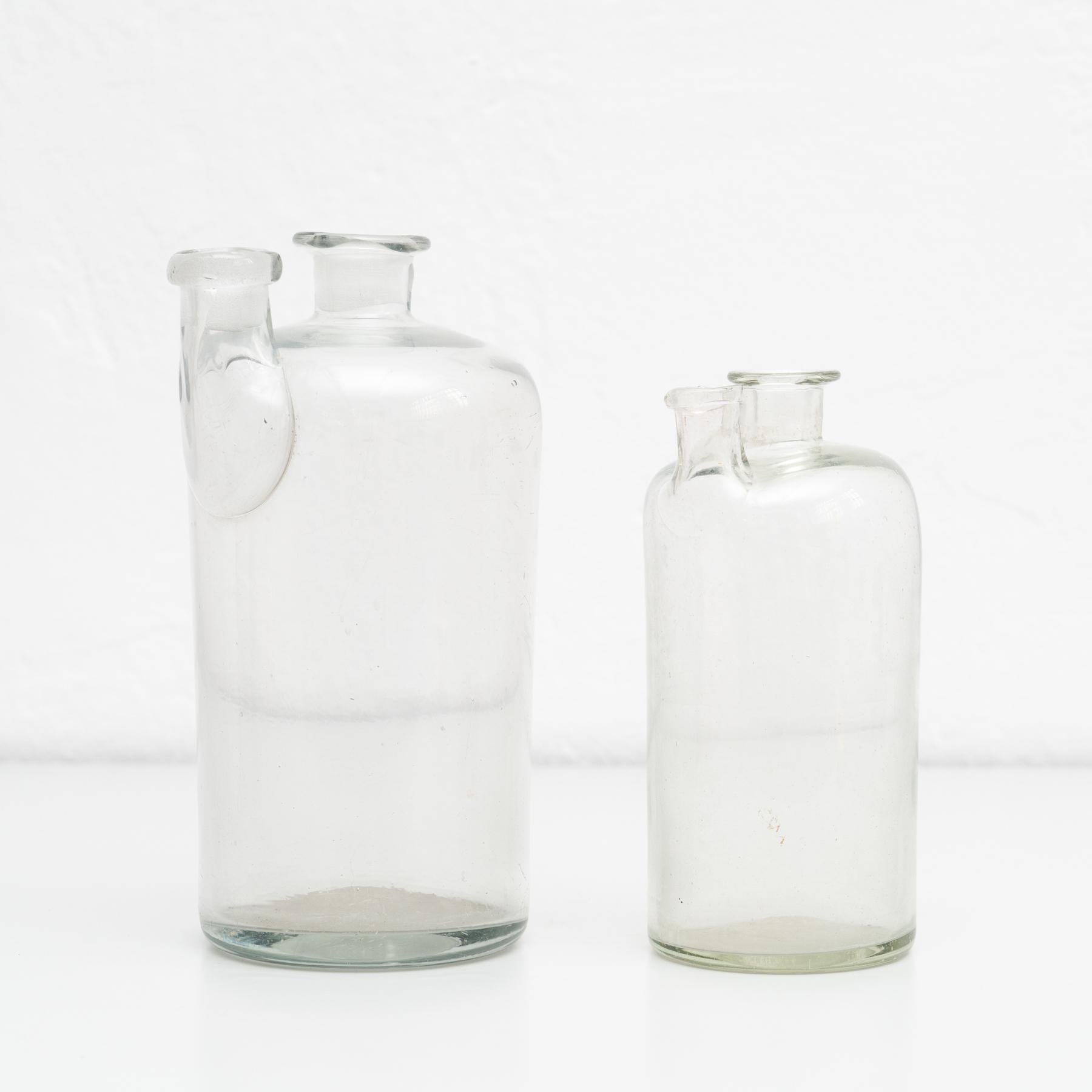 Set of 2 Early 20th Century Rustic Glass Bottles For Sale 5
