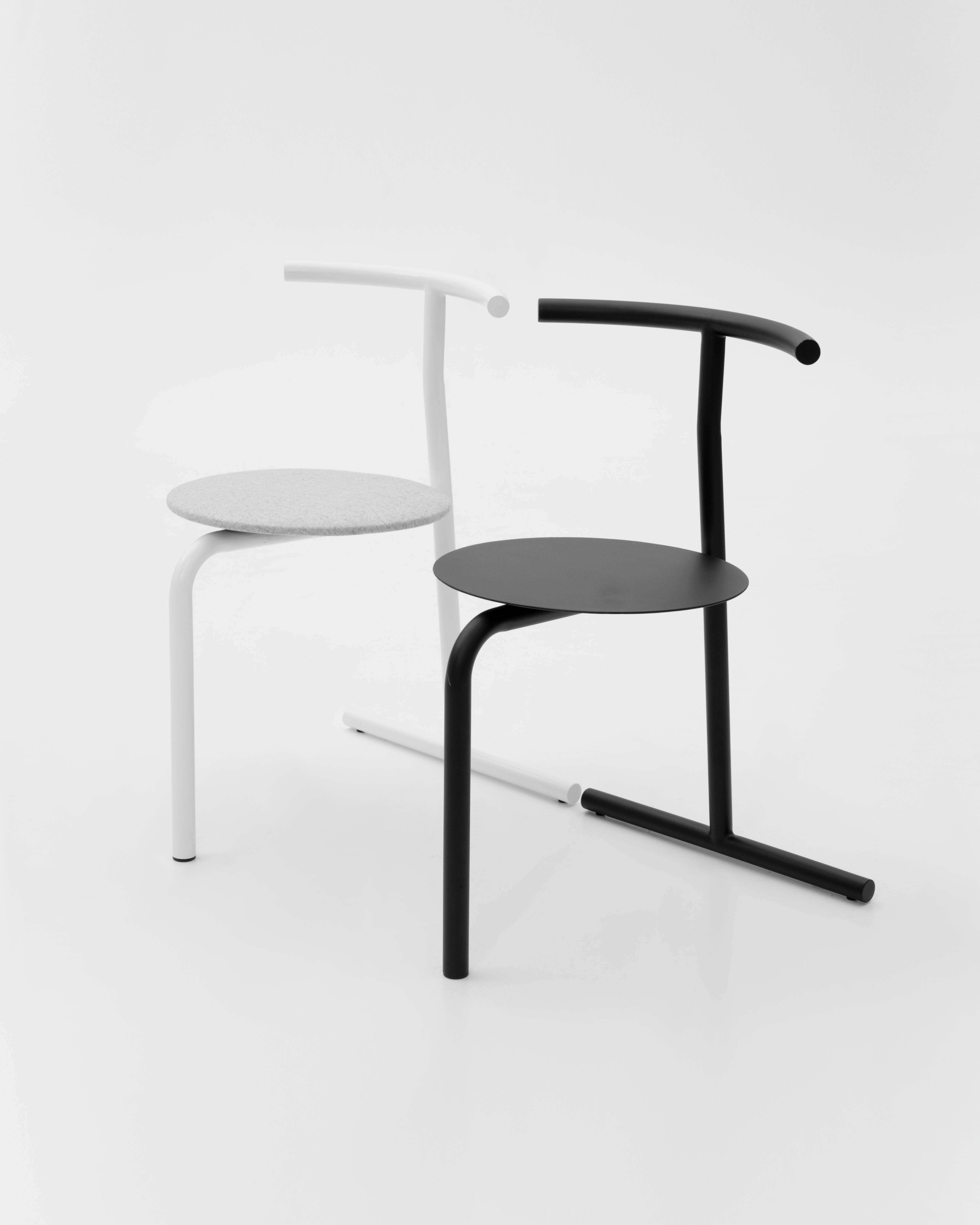 Set of 2 eater steel seats by Oito
Dimensions: D 50 x W 58 x H 78 cm each
Materials:Powder coated steel
Weight: 6 kg each
Also available in different base color: Black, white, blue
 
We've always wanted to create a chair with two legs. After