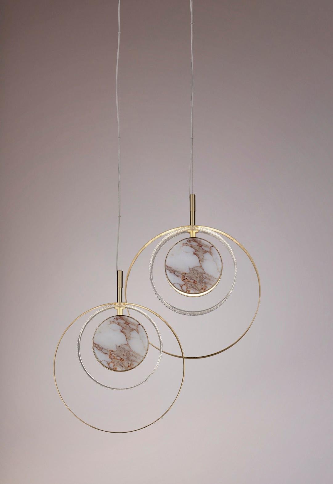 Set di 2 lampade a sospensione Eclissi S1 di Euroluce Lampadari
Dimensioni: D 7 x L 30 x H 30 cm.
Materiali: Alluminio, metallo, vetro e vetro marmorizzato.

Disponibile in diversi colori. I prezzi possono variare. Tutte le nostre lampade possono