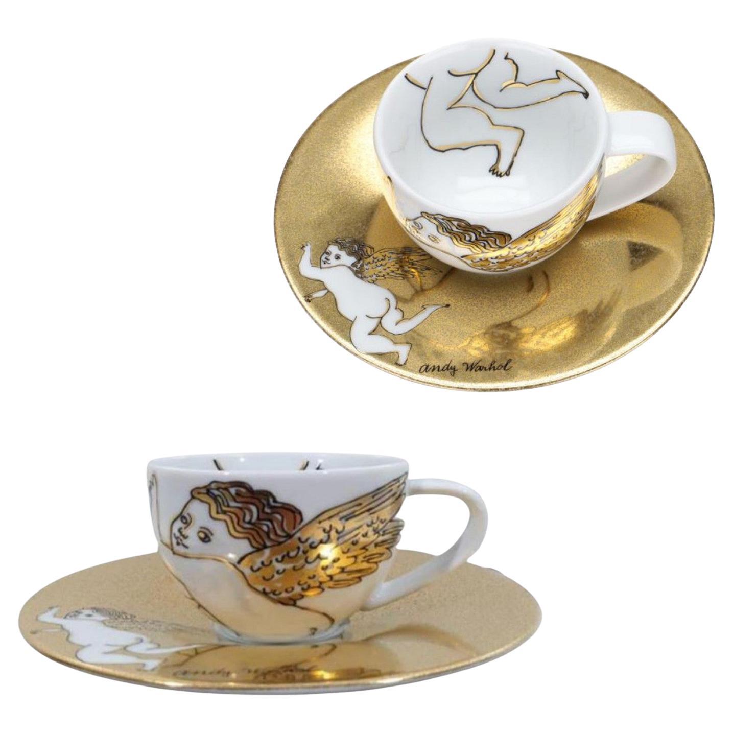https://a.1stdibscdn.com/set-of-2-espresso-cup-and-saucer-golden-angels-by-andy-warhol-for-rosenthal-198-for-sale/f_24363/f_314906321669616810692/f_31490632_1669616811134_bg_processed.jpg
