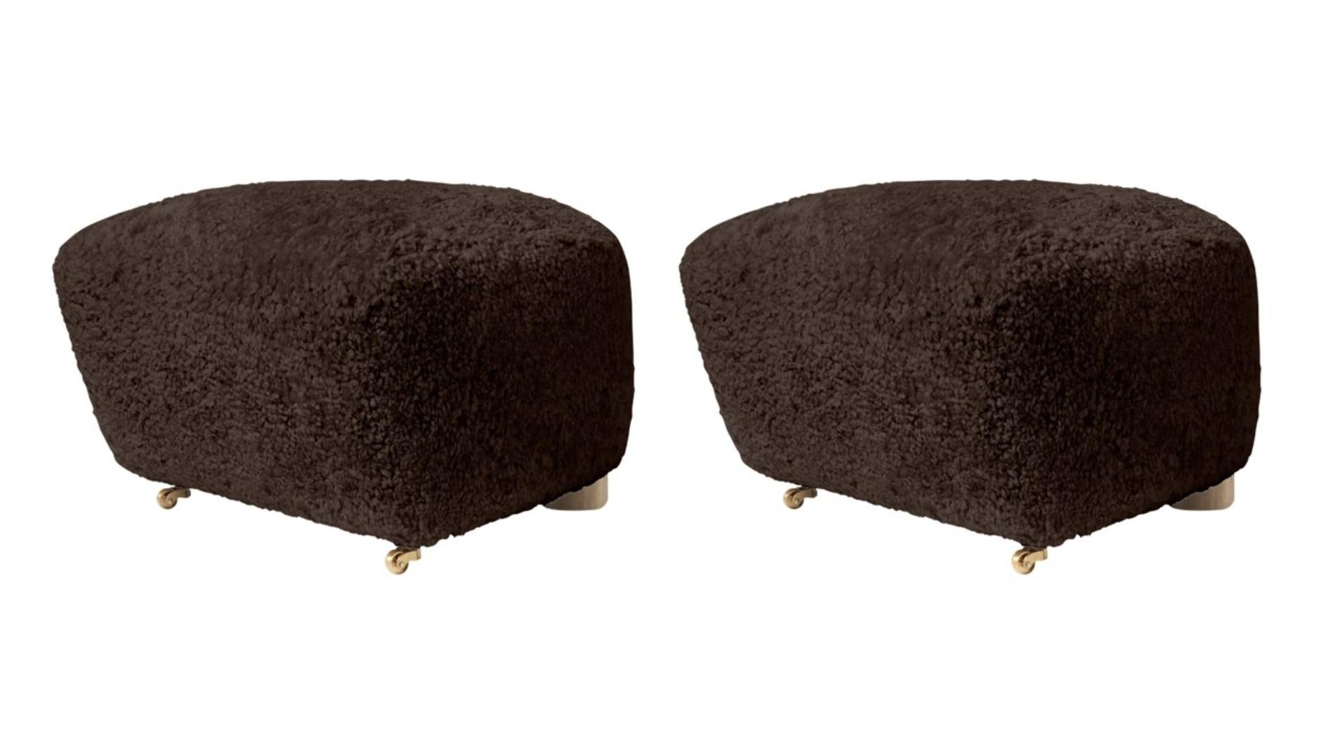 Set of 2 espresso natural oak sheepskin the tired man footstools by Lassen
Dimensions: W 55 x D 53 x H 36 cm 
Materials: Sheepskin

Flemming Lassen designed the overstuffed easy chair, The Tired Man, for The Copenhagen Cabinetmakers’ Guild