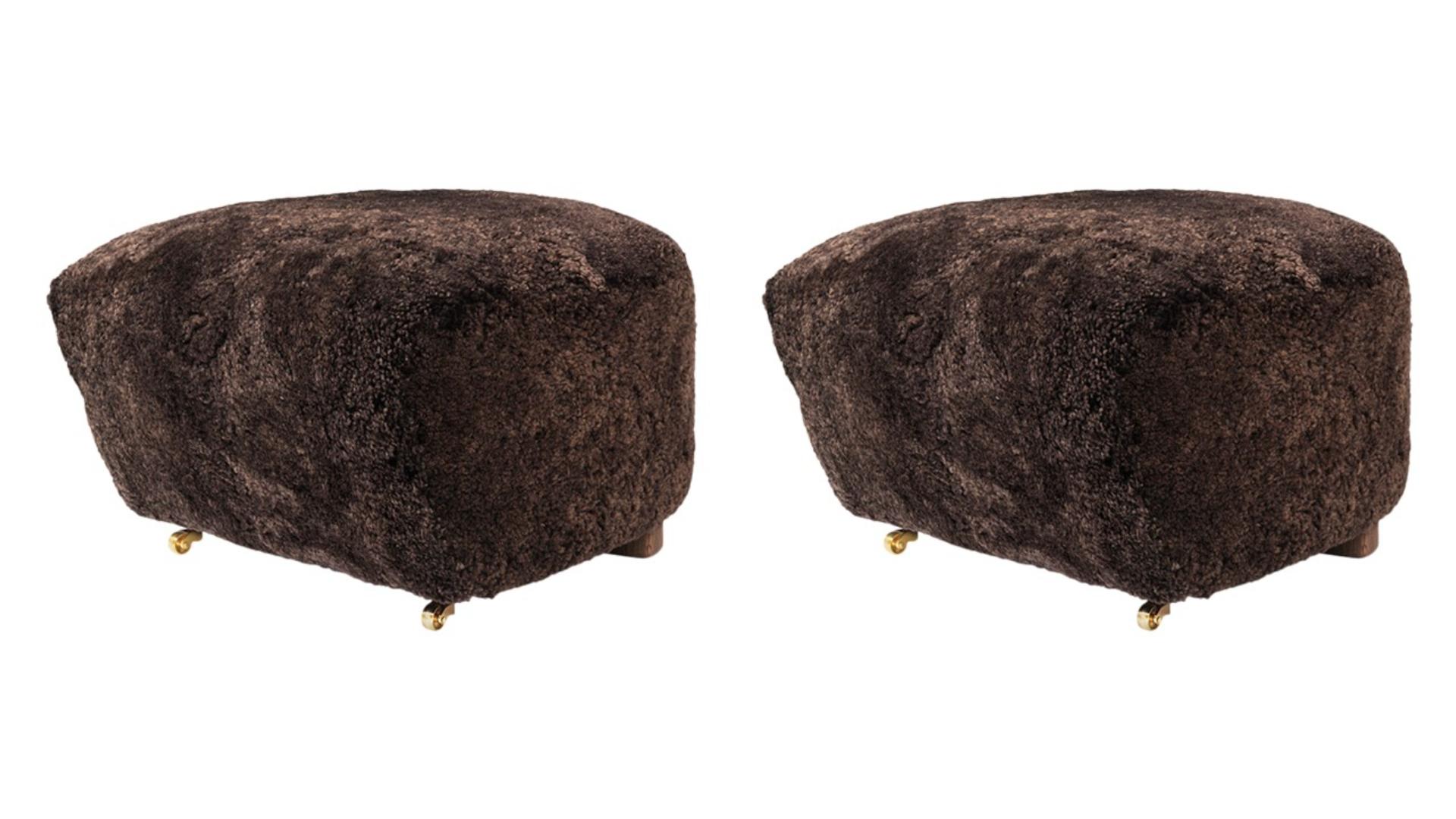 Set of 2 espresso smoked oak sheepskin the tired man footstools by Lassen
Dimensions: W 55 x D 53 x H 36 cm 
Materials: Sheepskin

Flemming Lassen designed the overstuffed easy chair, The Tired Man, for The Copenhagen Cabinetmakers’ Guild