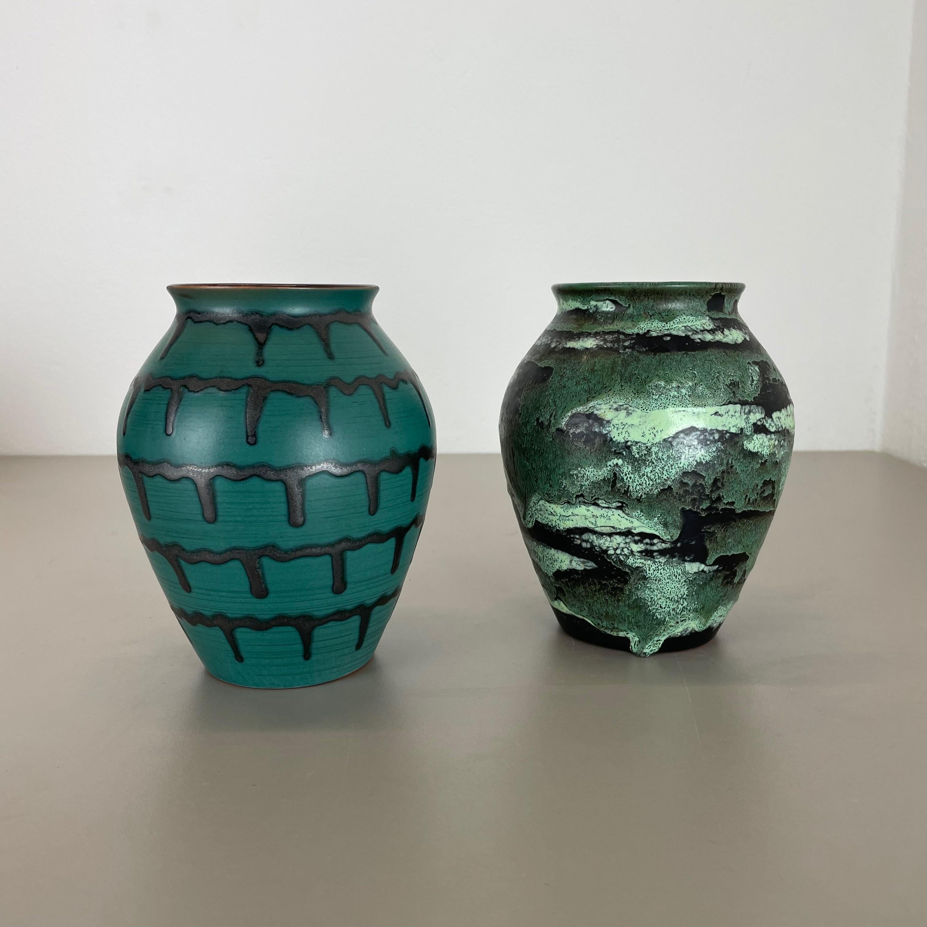 Article:

Ceramic pottery vases set of 2


Origin:

Germany


Designer:

Heinz Siery


Producer:

Carstens Tönnieshof, Germany


Decade:

1970s


This original vintage pottery object was designed by Heinz Siery and produced by Cartens Tönnieshof