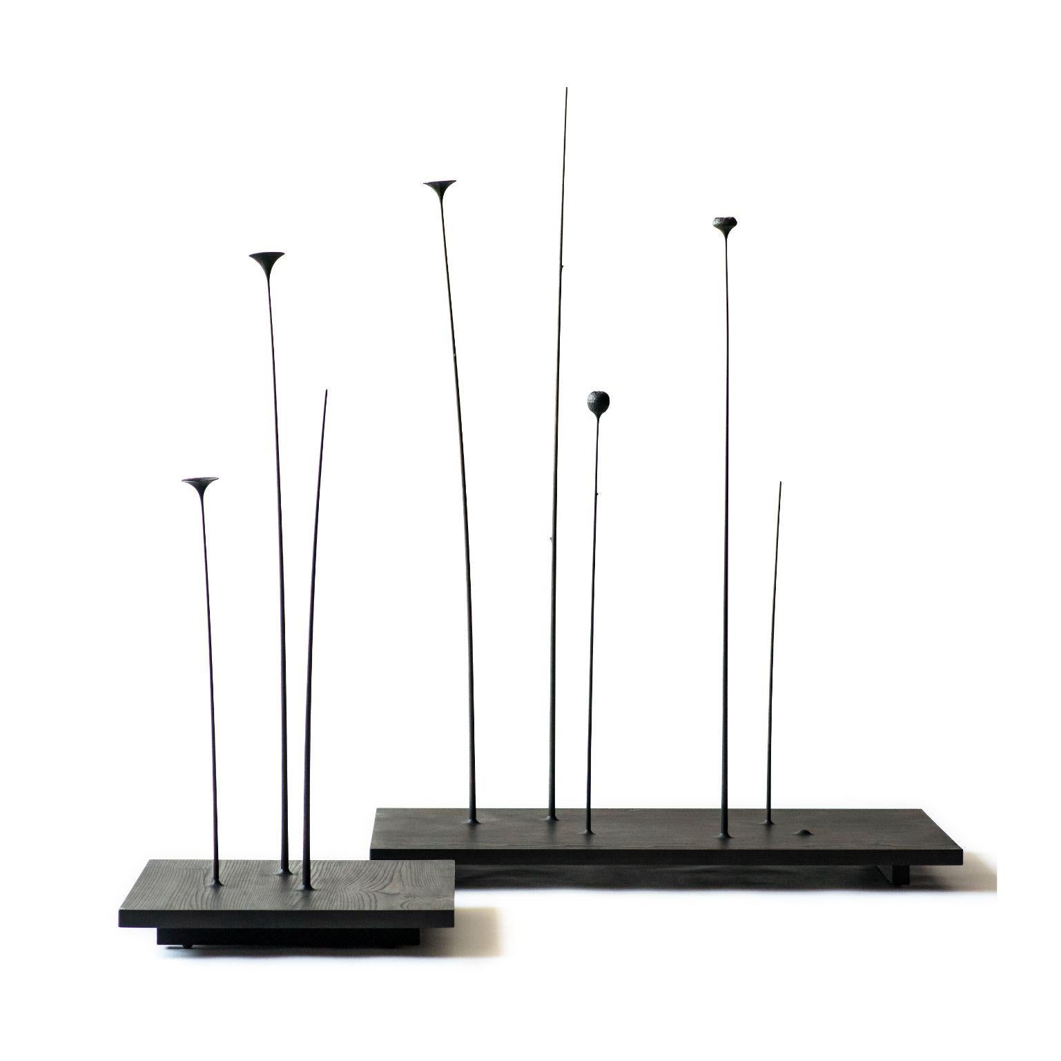 Set of 2 fiori sculptures by Antrei Hartikainen
Materials: Flowers (Linden wood), baseplate (Ash/maple)
Dimensions: W 120 x D 60 x H 150 - 170 cm, W 60 x D 60 x H 150 - 170 cm

The Fiori sculpture composes of slender-stemmed wooden flowers,