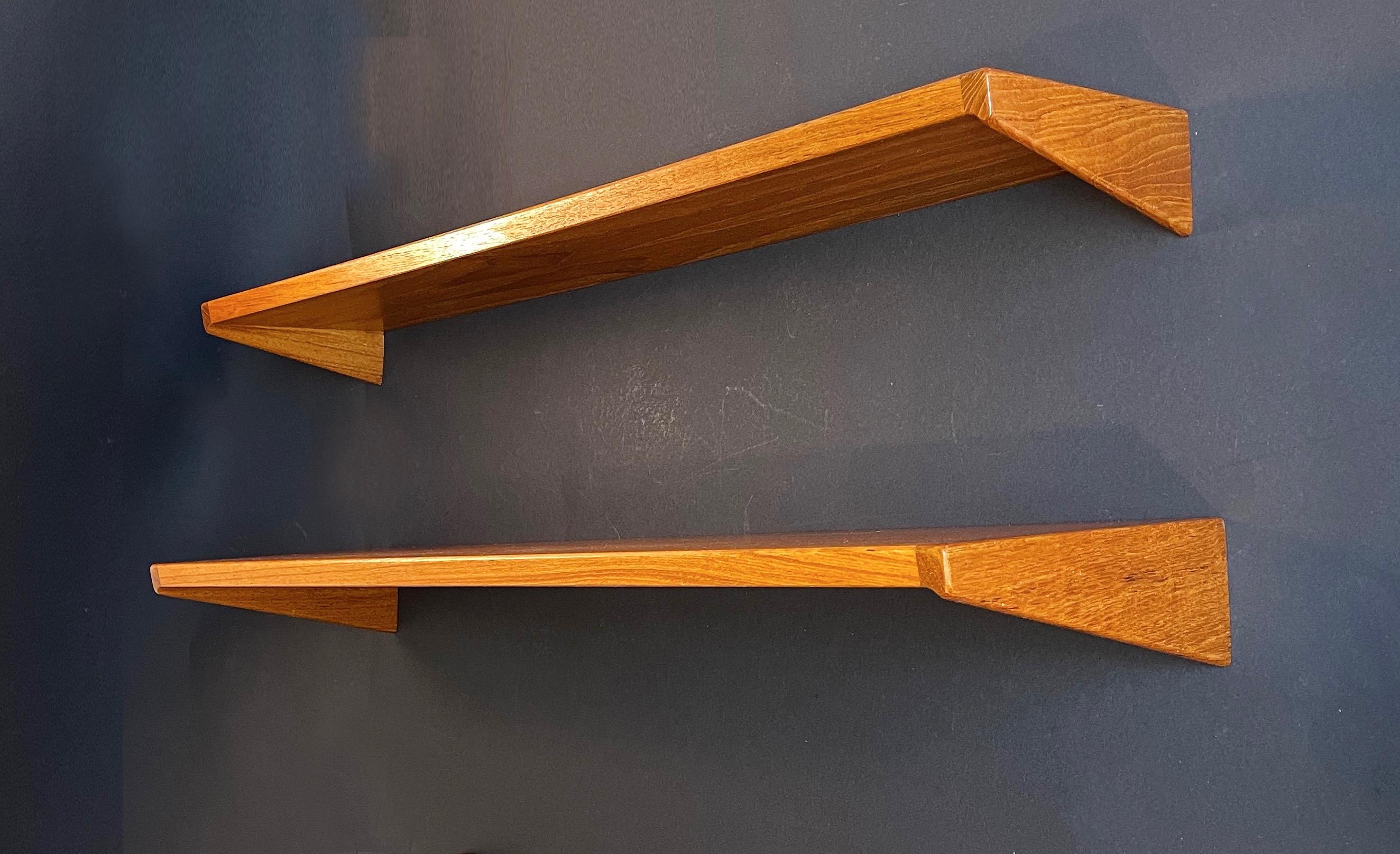 Absolute rare design classics by Kai Kristiansen for Feldalles Møbler in the 1960s, Denmark.
Kai was one of the best known and acclaimed designers of mid century furniture in Europe.

Here a set of 2 floating shelves from honey coloured teak in 2
