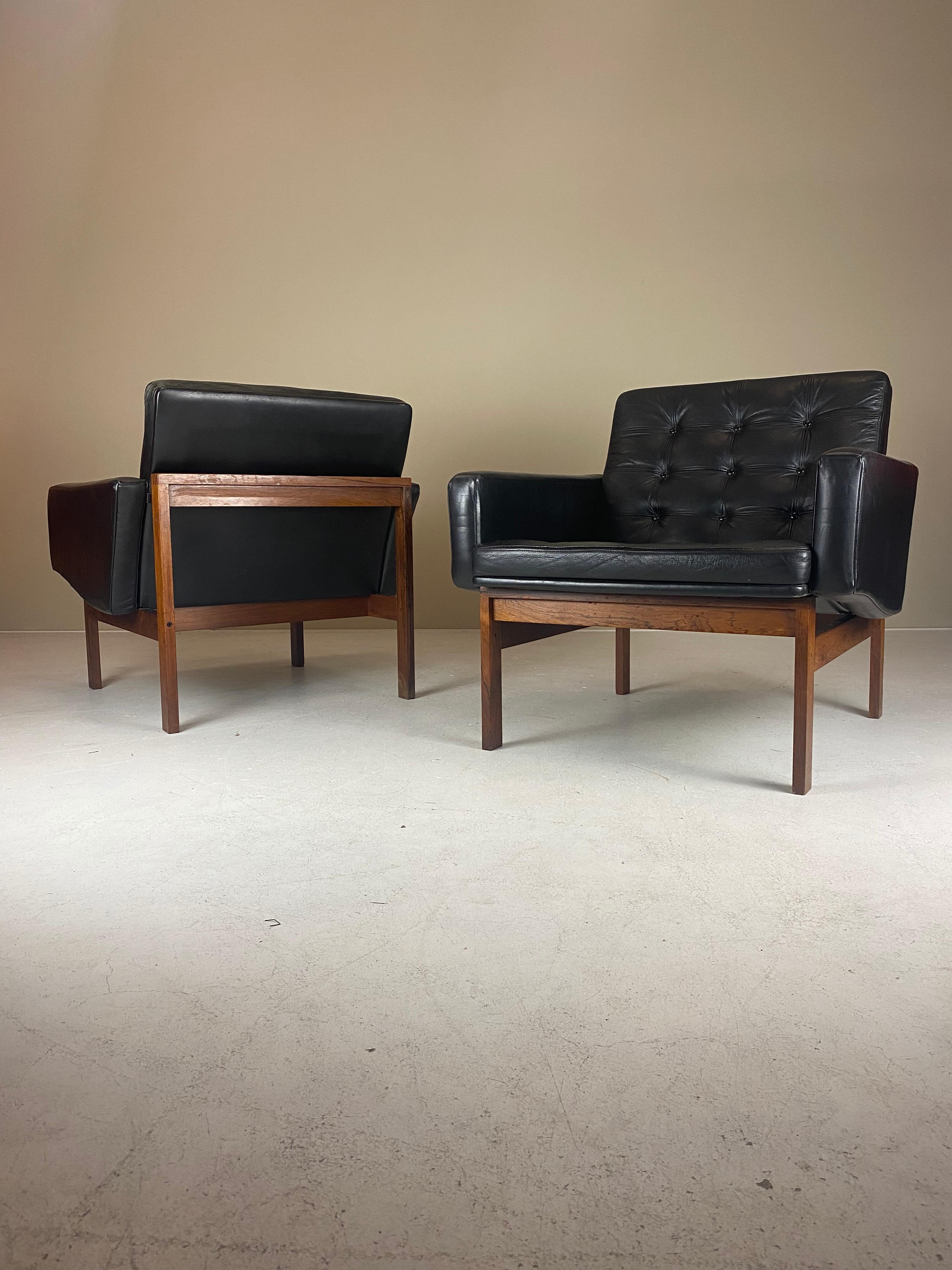 Listed is a pair of iconic ‘Moduline’ rosewood and leather armchairs by Ole Gerlev Knudsen and Torben Lind for France & Son, Denmark. Chairs are in fair original condition, ‘dans son jus’. 

The rosewood actually is in immaculate condition, however