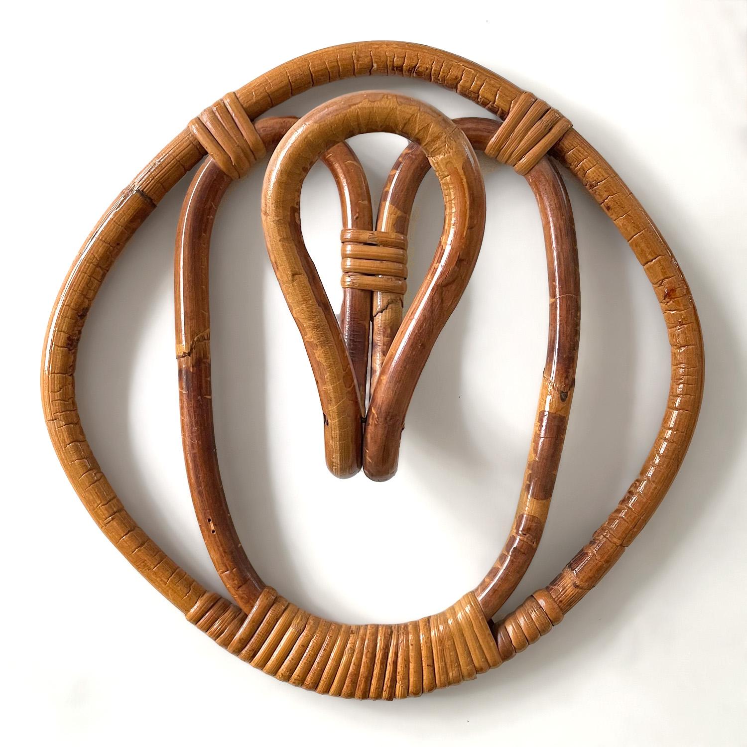 Franco Albini and Franca Helg rattan coat hooks
Produced by Bonacina
Italy, circa 1960's
Beautiful variations in the rattan
Hand woven detail
Sold as a set of 2.
