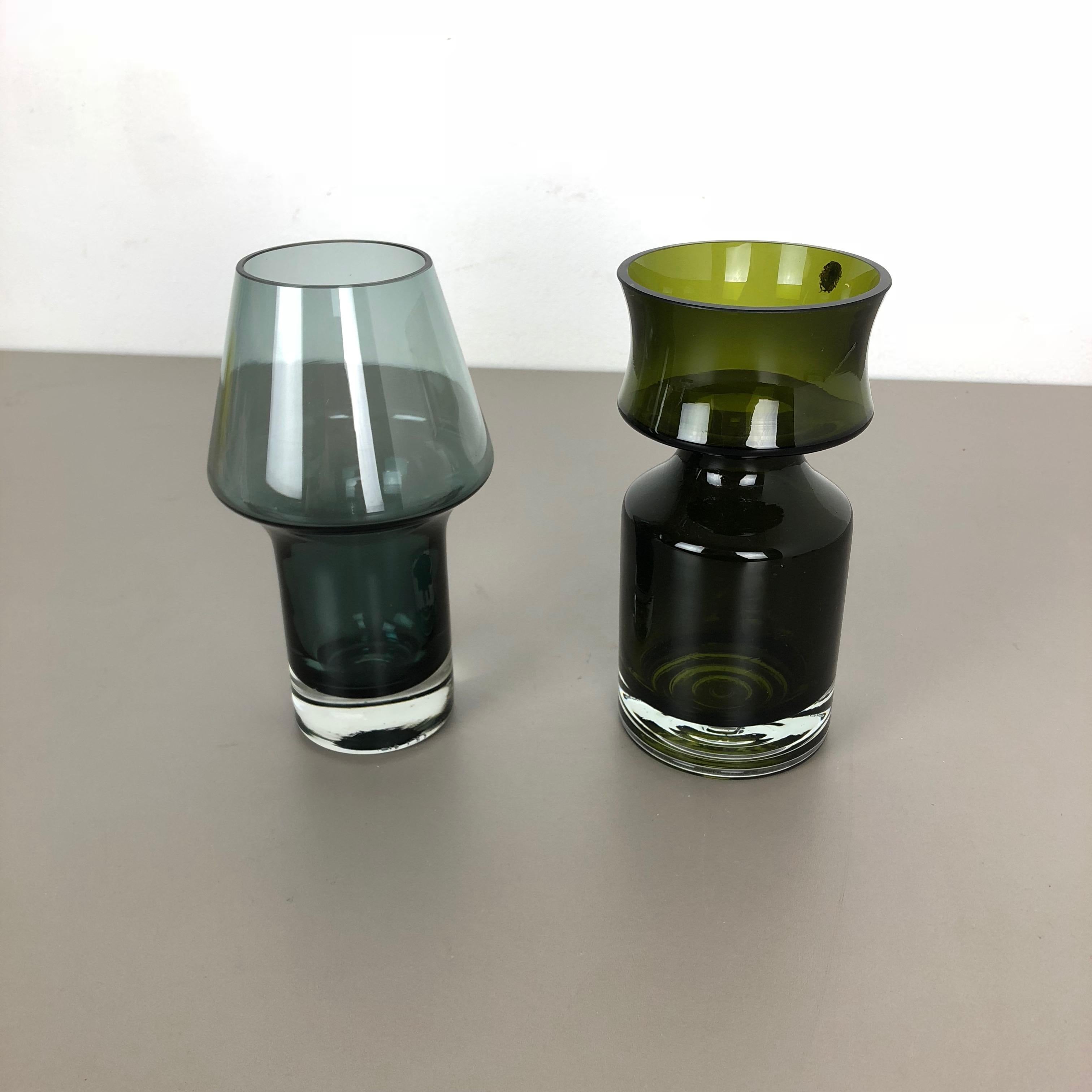 Article:

Set of 2 glass vases


Producer:

Riihimaen Lasi Oy, Finland



Designer:

Tamara Aladin


Decade:

1970s




Set of 2 original super rare vintage Vases by Tamara Aladin for Riihimaen Lasi Oy. The vases were produced