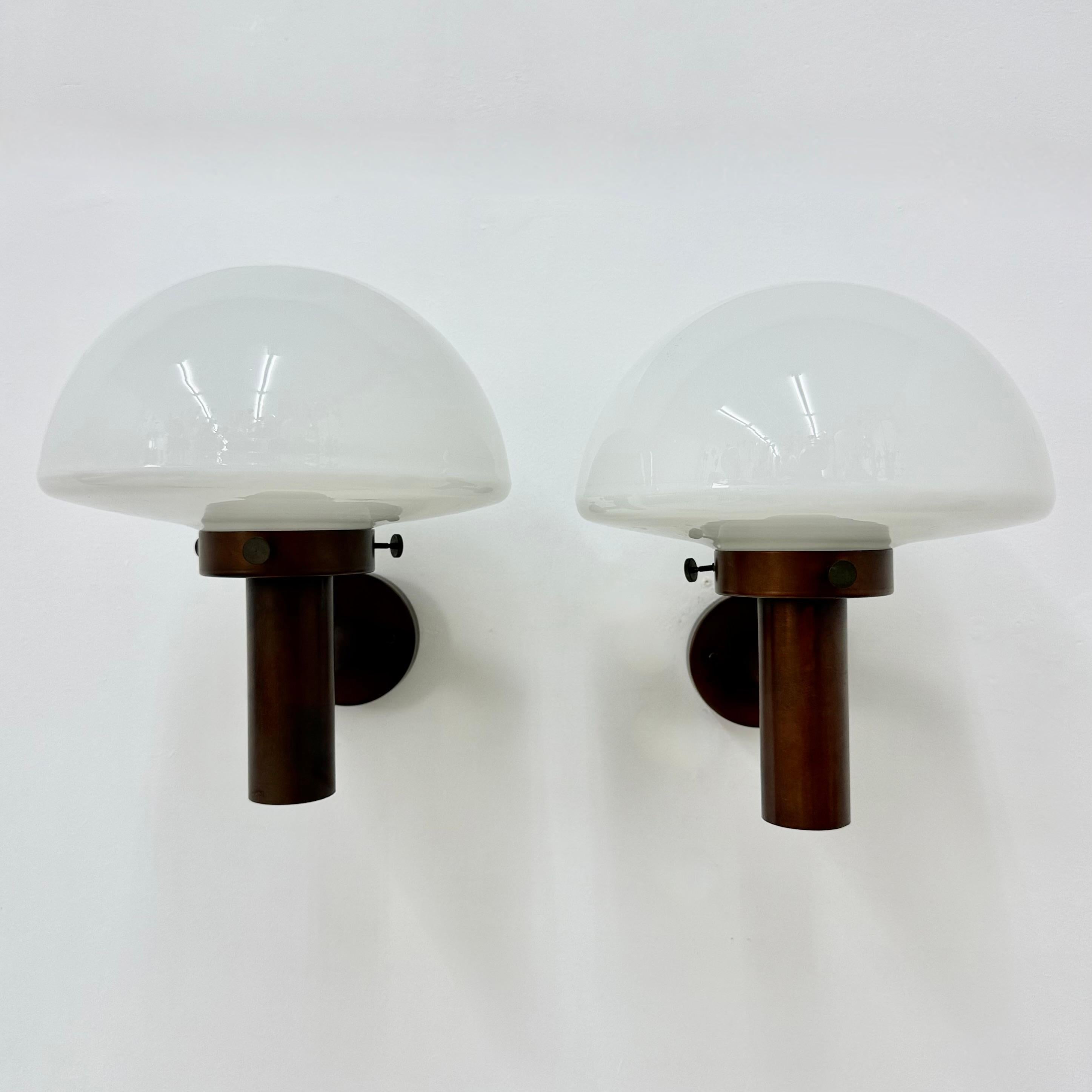 Set of 2 globe glass wall lamps sconces by Lisa Pape Sweden , 1970s
For outdoor use as well
Dimensions: 34cm Depth, 28cm Width, 32cm Heigtht
Condition: Good
Period: 1970s
Color: Red copper , glass