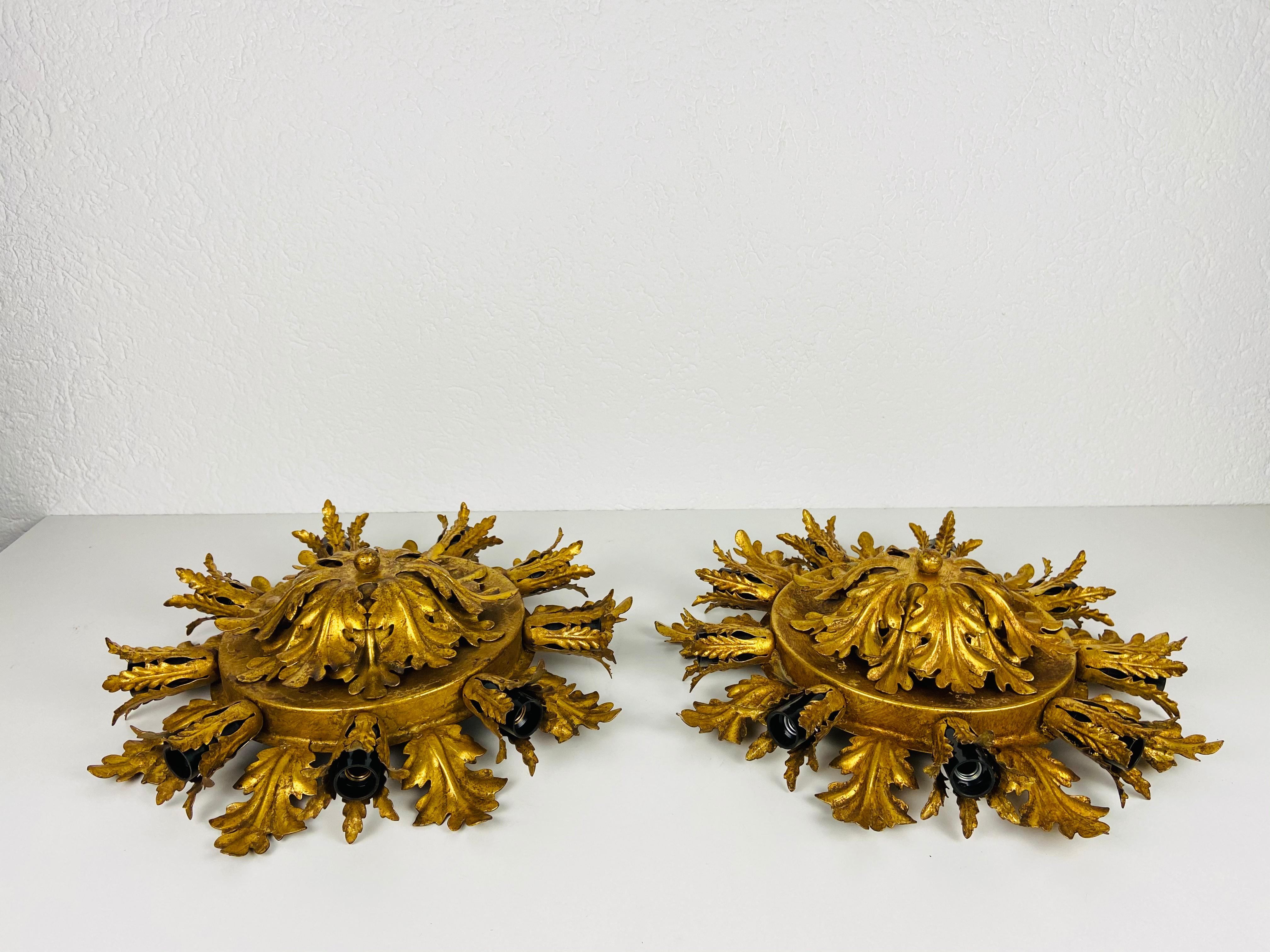 A set of brass flushmounts by Banci made in Italy in the 1950s. The lamp has a beautiful wheat sheaf design. It is made in the period of Hollywood Regency. 

The light requires E14 light bulbs. Works with both 120/220V. Very good vintage