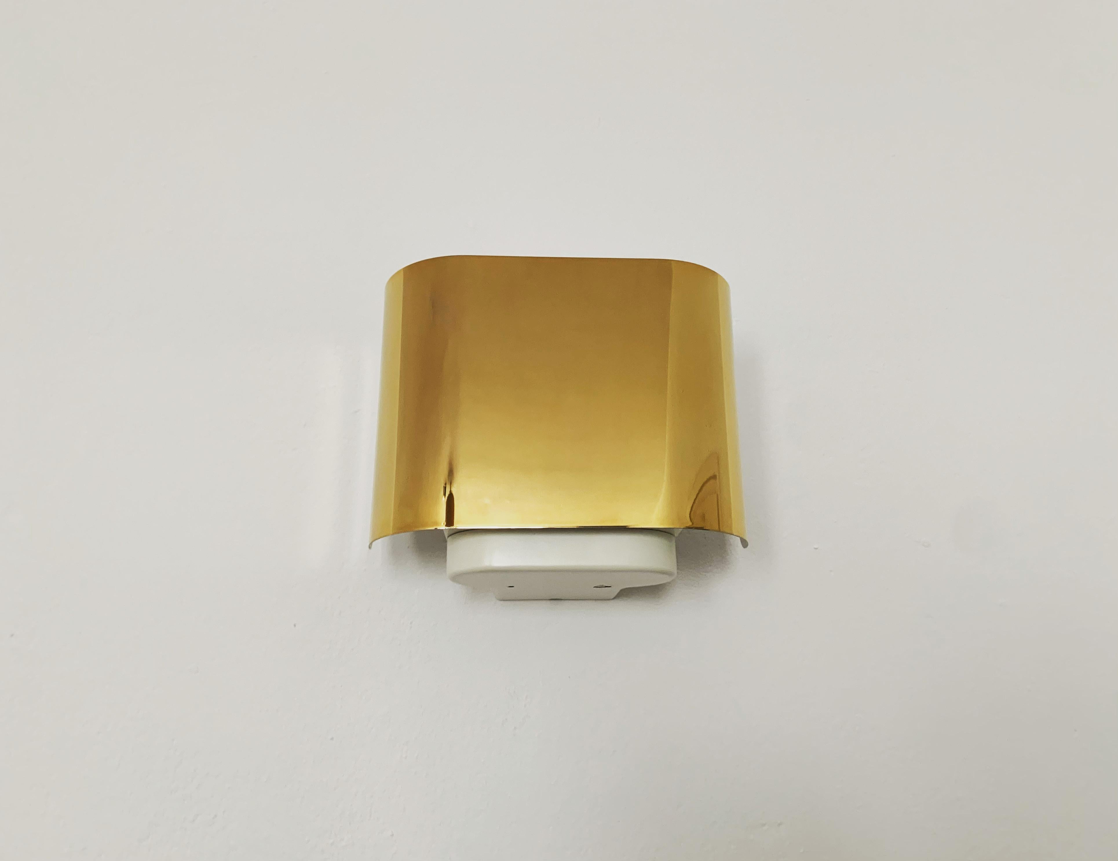 Tedesco Set di 2 lampade da parete dorate di Staff in vendita
