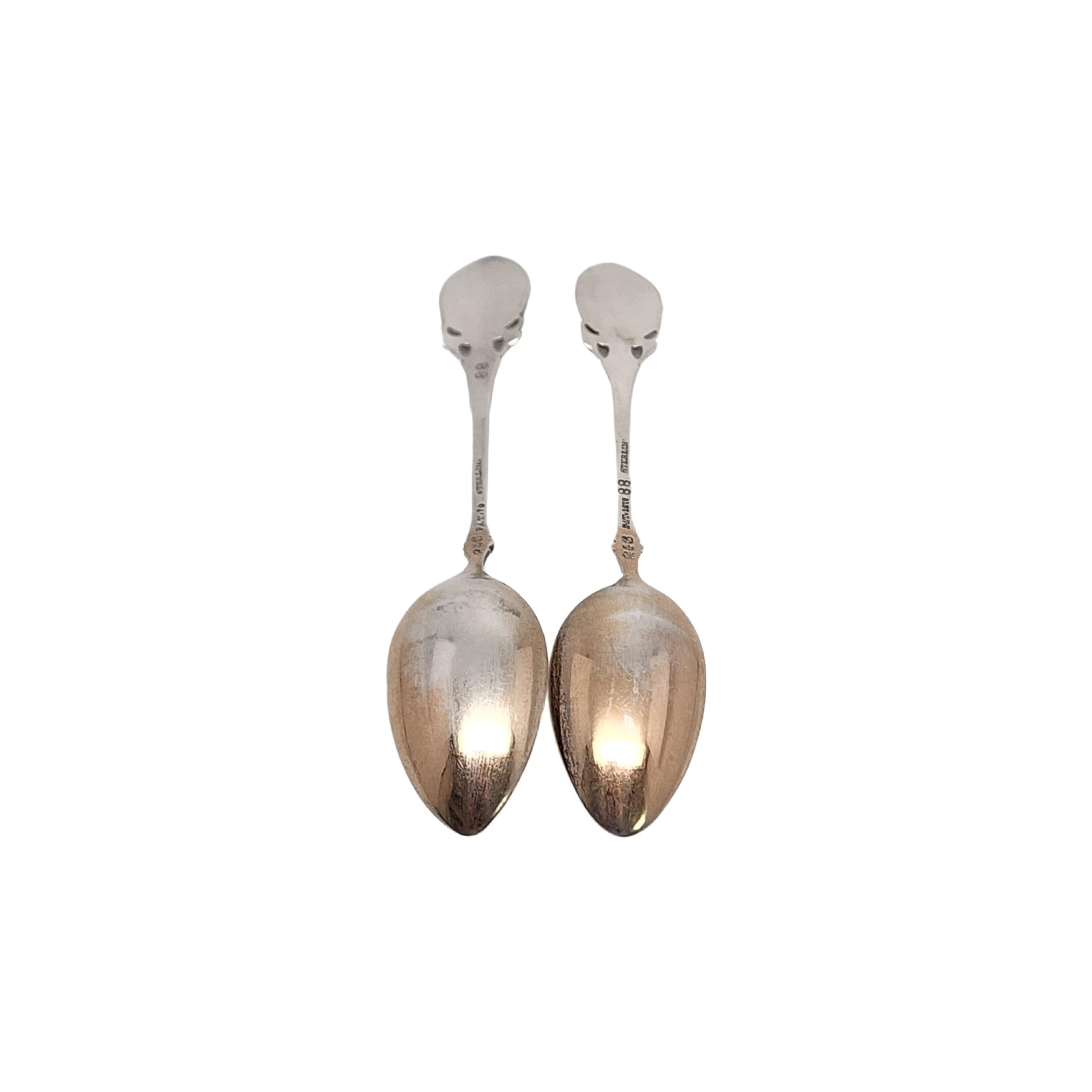 Set of 2 antique sterling silver demitasse spoons by Gorham in the Lily 1870 pattern.

No monogram

Gorham's Lily pattern was designed by George Wilkinson, these small spoons feature a gold wash bowl.

Measures approx 4 1/8