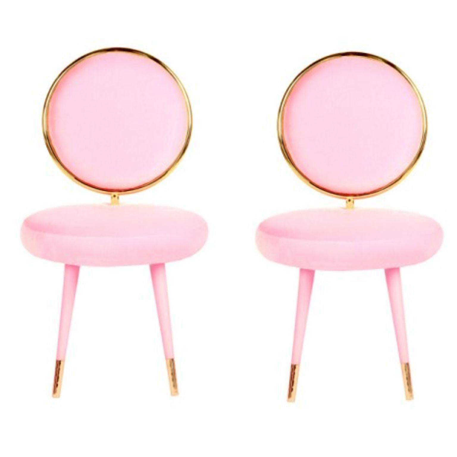 Set of 2 Graceful dining chairs, Royal Stranger
Dimensions: 95 x 54 x 54 cm
Materials: Blossom pink velvet upholstery with stainless steel coated in brass frame elevated by lacquered wood legs and brass feet covers.

Available in: Mint green,