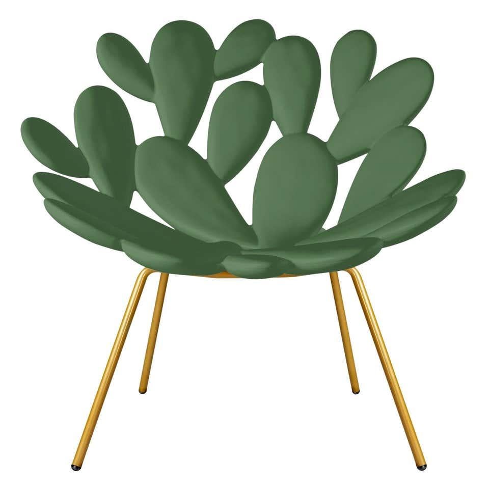 Set of 2 green and brass indoor / outdoor cactus chairs
This green and brass armchair features a brass finish midcentury legs.
The prickly pear is an iconic plant of the Mediterranean. It represents the welcoming traits of the land in which it