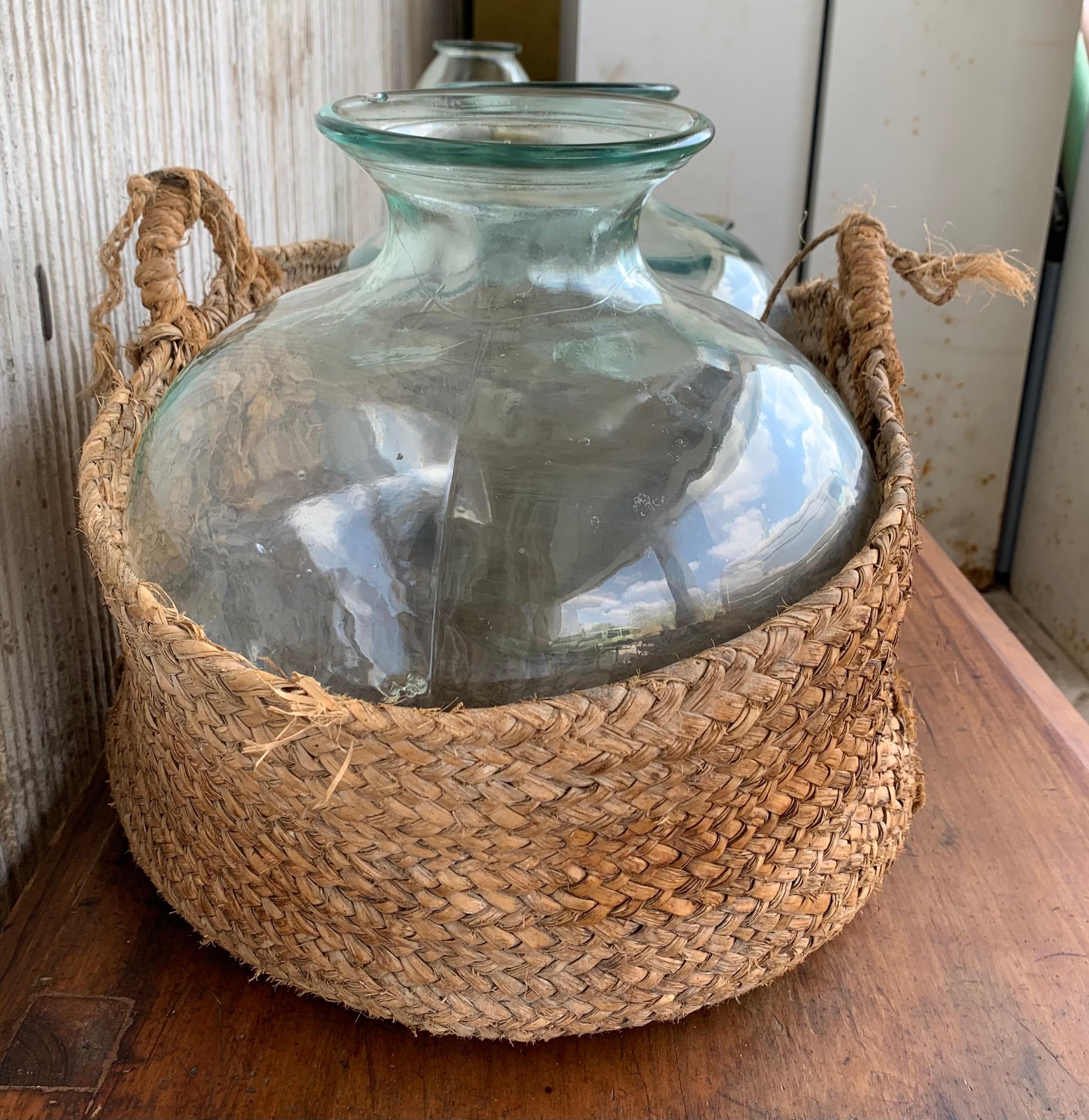 19th Century Set of 2 Green Glass French Demijohn Bottles with Woven Esparto Basket For Sale