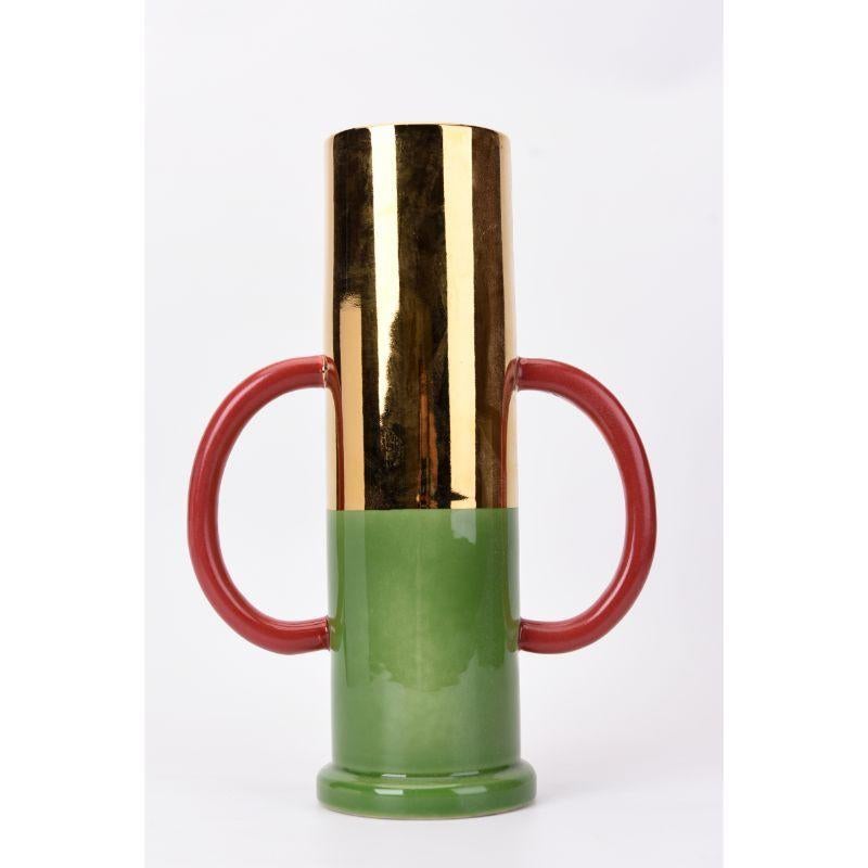 Set of 2 green vases by WL Ceramics
Designer: Norman Trapman
Materials: Porcelain
Dimensions: H36 x D25 cm (Green and gold), 30 x 20 cm (Green and blue).

Also available in different colors and shapes

At WL CERAMICS we make porcelain with