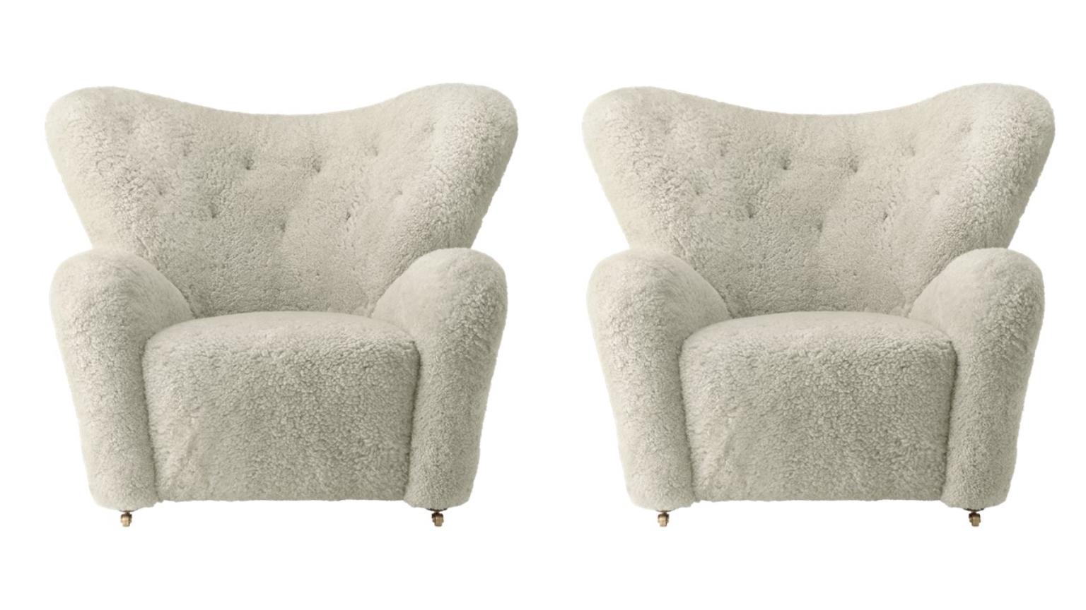 Set of 2 green tea sheepskin The Tired Man Lounge chair by Lassen
Dimensions: W 102 x D 87 x H 88 cm 
Materials: Sheepskin

Flemming Lassen designed the overstuffed easy chair, The Tired Man, for The Copenhagen Cabinetmakers’ Guild Competition