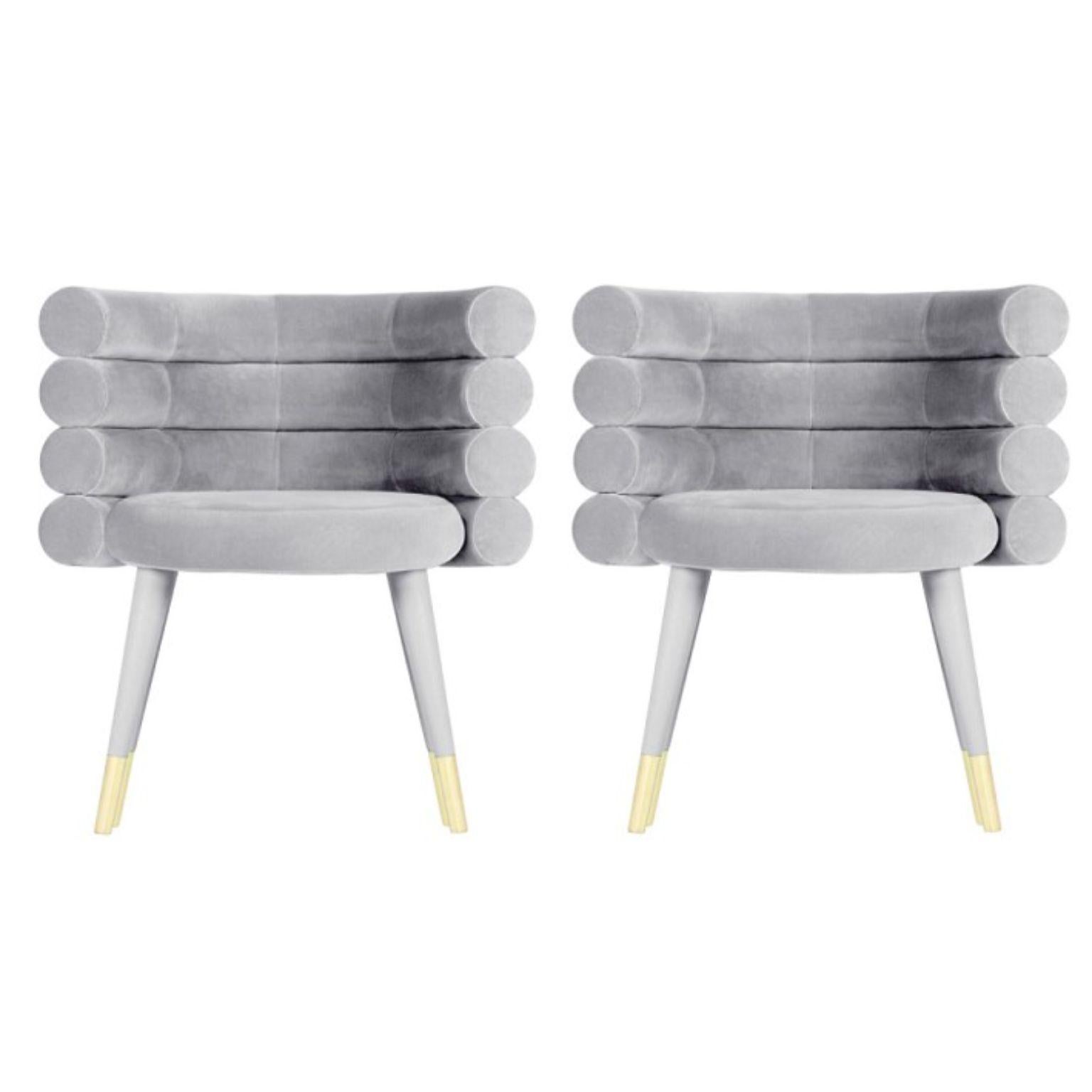 Set of 2 grey Marshmallow dining chairs, Royal Stranger
Dimensions: 78 x 70 x 60 cm
Materials: Velvet upholstery and brass
Available in: Mint green, light pink, royal green and royal red

Royal Stranger is an exclusive furniture brand