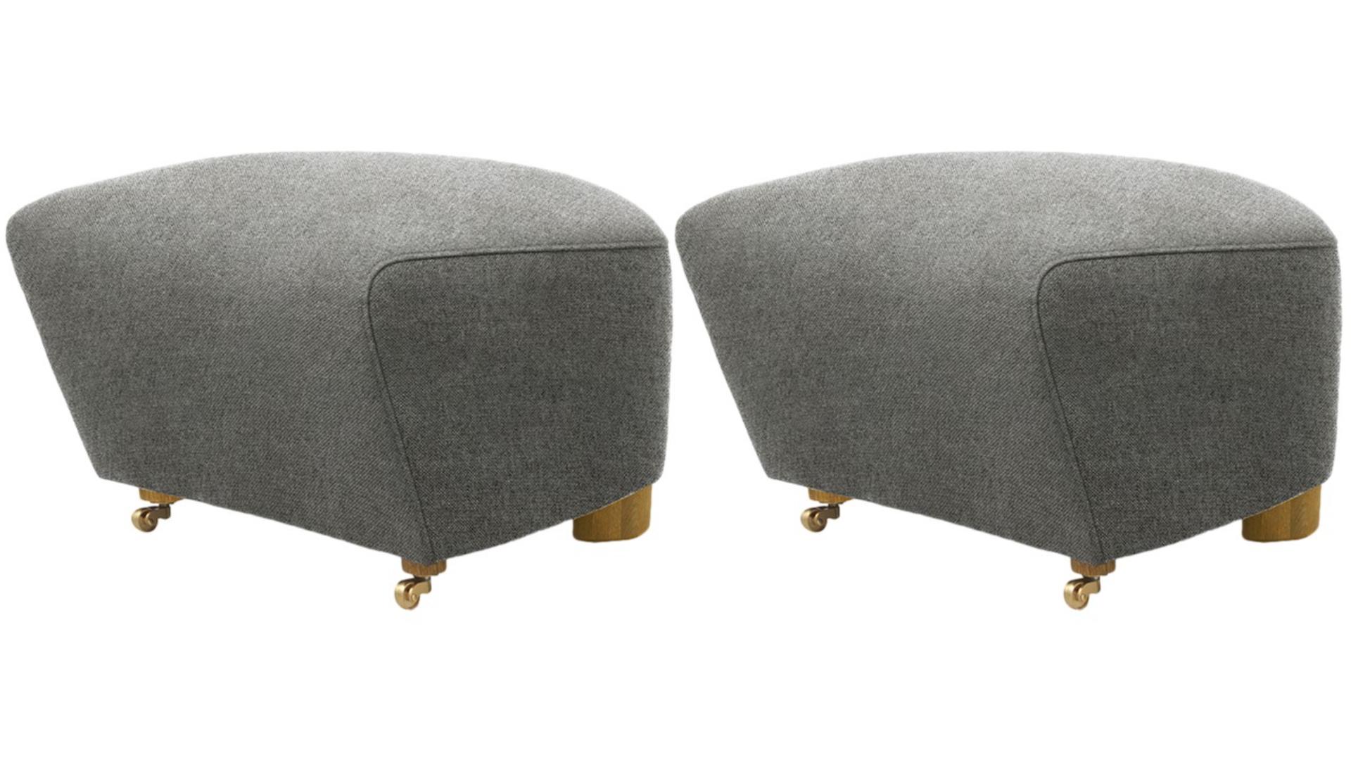 Set of 2 grey natural oak Hallingdal the tired man footstools by Lassen
Dimensions: W 55 x D 53 x H 36 cm 
Materials: Textile

Flemming Lassen designed the overstuffed easy chair, The Tired Man, for The Copenhagen Cabinetmakers’ Guild