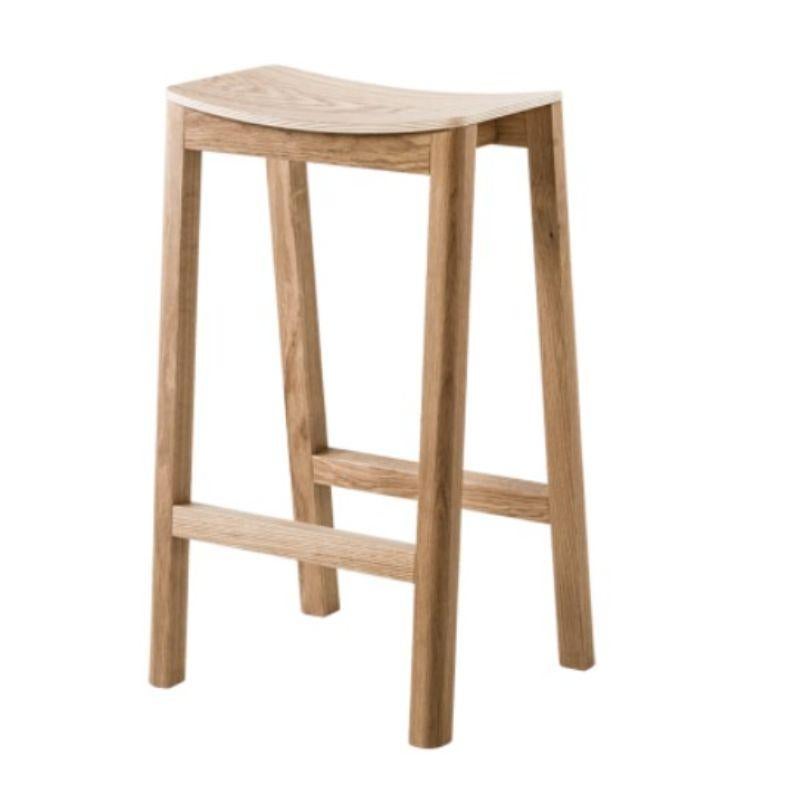 Set of 2, Halikko bar stools by Made By Choice
Dimensions: 40 x 34 x 66 cm
Materials: solid oak
 Standard finishes: natural wood / painted black.

Also available: upholstery in fabric or std. fabric (category 1 & 2), custom color or