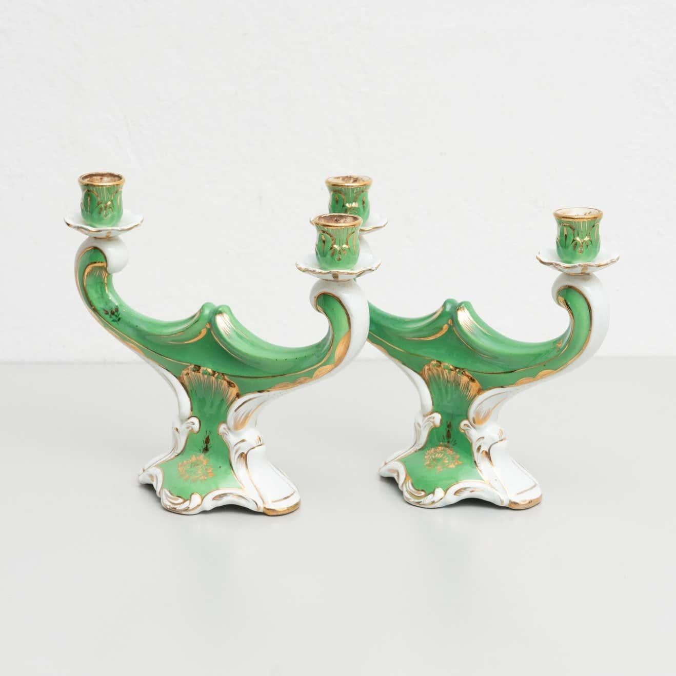 Set of 2 hand painted ceramic candle holders, circa 1930

By Unknown manufacturer. Spain.

In original condition, with minor wear consistent with age and use, preserving a beautiful patina.

Materials:
Ceramic.
 