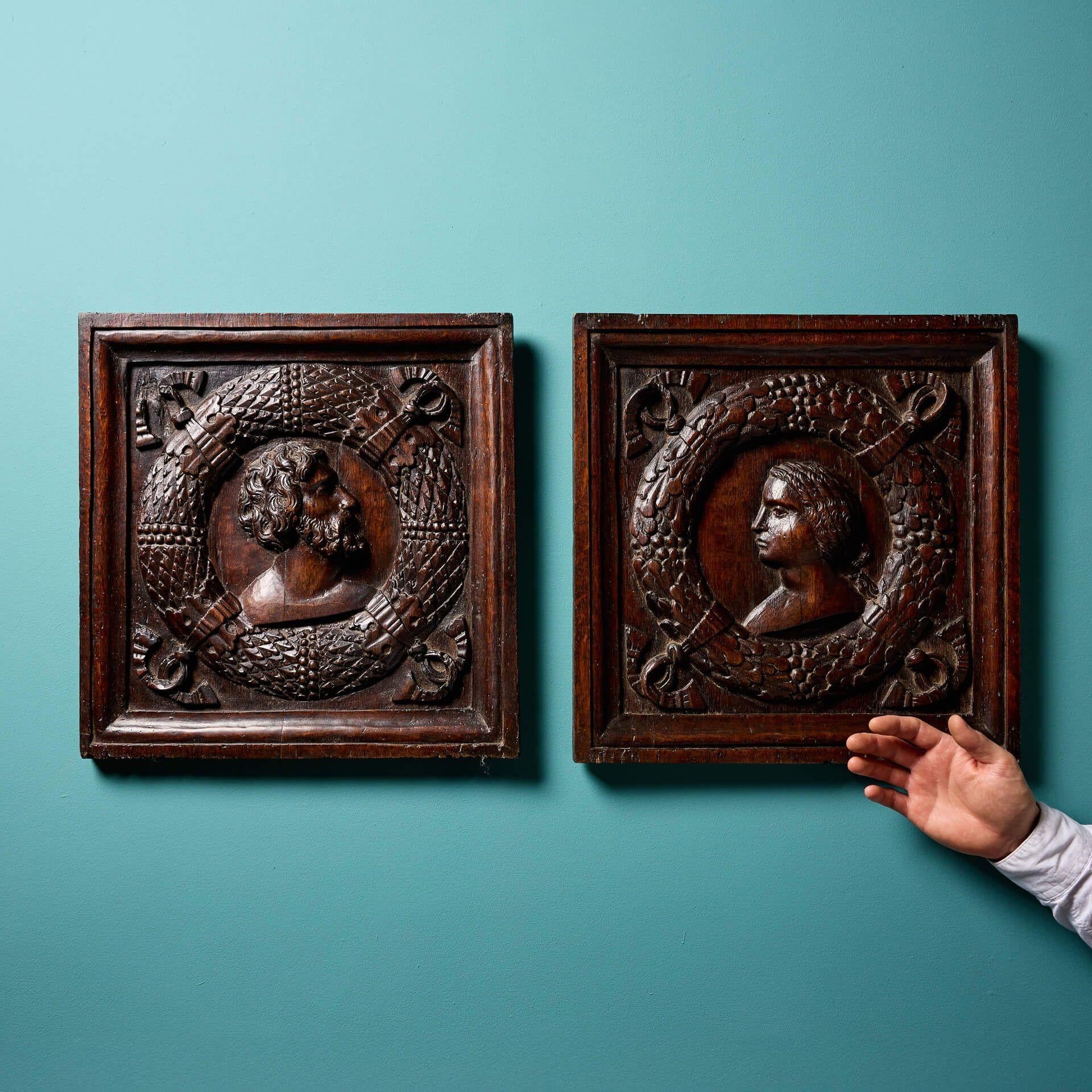 A pair of handcarved mid 17th century oak wall panels with a handsome, even patina and string for hanging. Each are of beautiful quality after more than 370 years and well-carved for the period, other decorative pieces of the era often simpler and