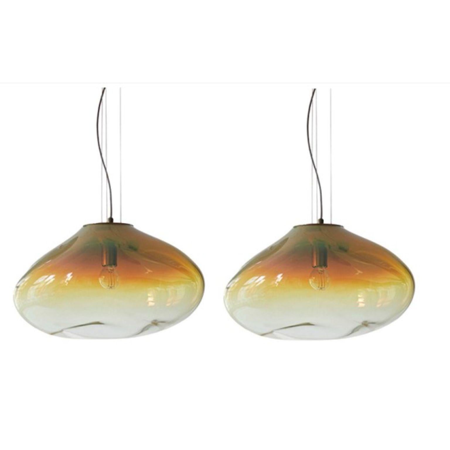 Set of 2 haumea amorph amber iridescent L pendants by Eloa.
No UL listed 
Material: glass, steel, silver, LED bulb.
Dimensions: D27 x W39 x H30 cm
Also available in different colours and dimensions.

All our lamps can be wired according to each