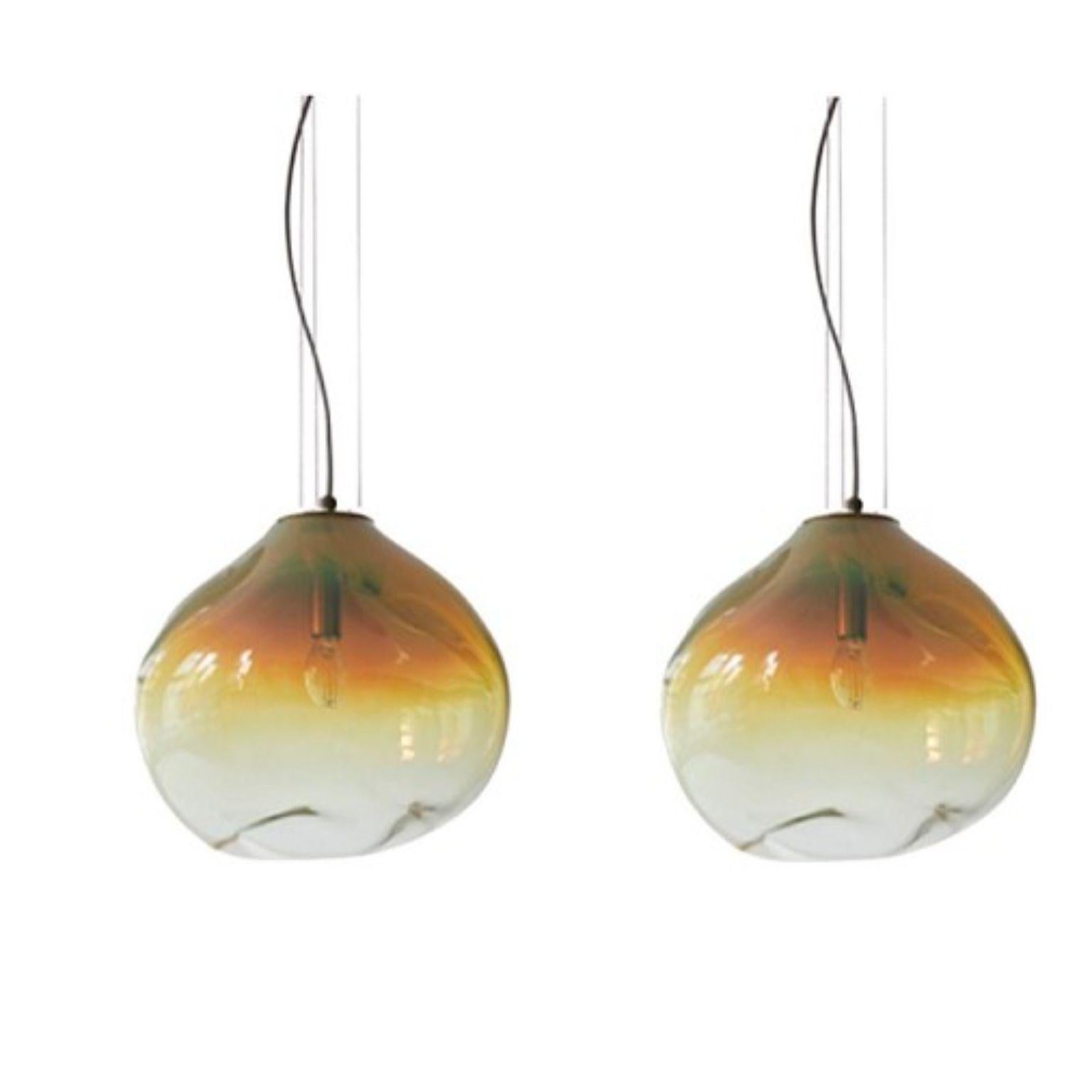 Set of 2 Haumea Amorph amber iridescent M pendants by Eloa.
No UL listed 
Material: glass, steel, silver, LED bulb.
Dimensions: D30 x W32 x H27 cm
Also available in different colours and dimensions.

All our lamps can be wired according to each
