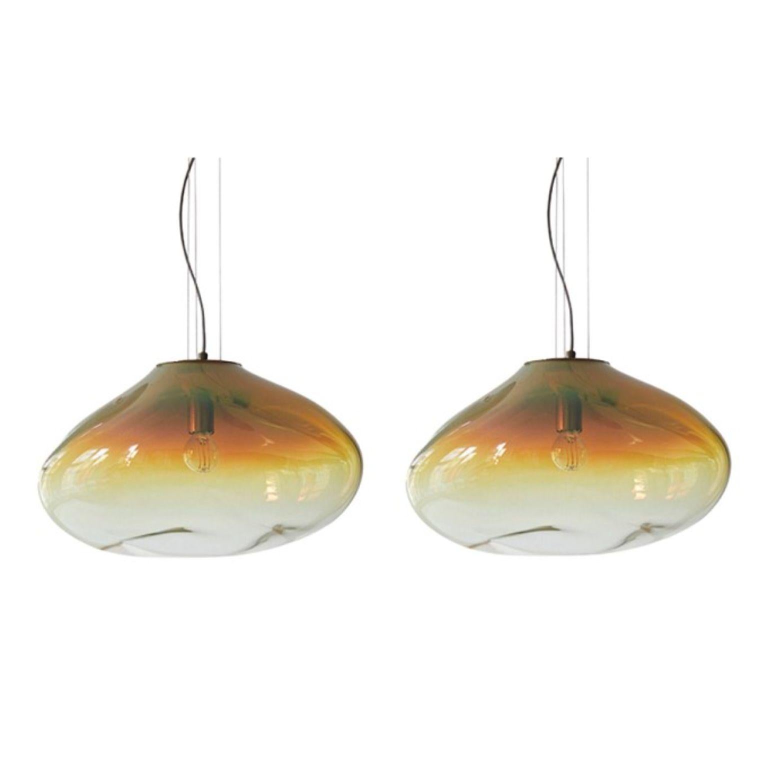 Set of 2 haumea amorph amber iridescent xl pendants by Eloa.
No UL listed 
Material: glass, steel, silver, LED bulb.
Dimensions: D 35 x W 47 x H 32 cm.
Also available in different colours and dimensions.

All our lamps can be wired according to each