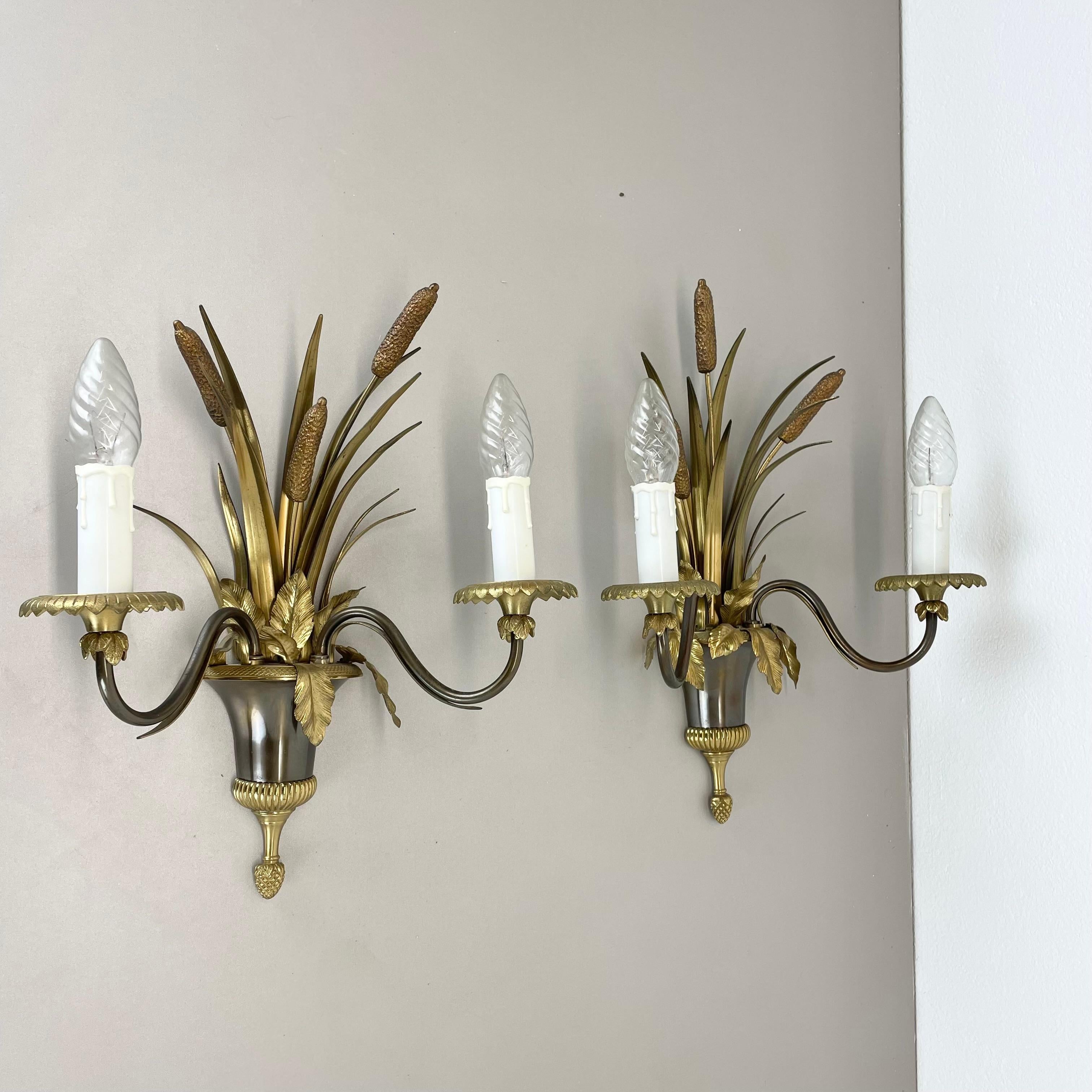 Article: unique hollywood regency wall light set of 2

Origin: France

Design producer: MAISON CHARLES (one light is marked on the backside wall fixation with CHARLES and made in France)

Material:  brass, metal plastic

Decade: 1970s

Description: